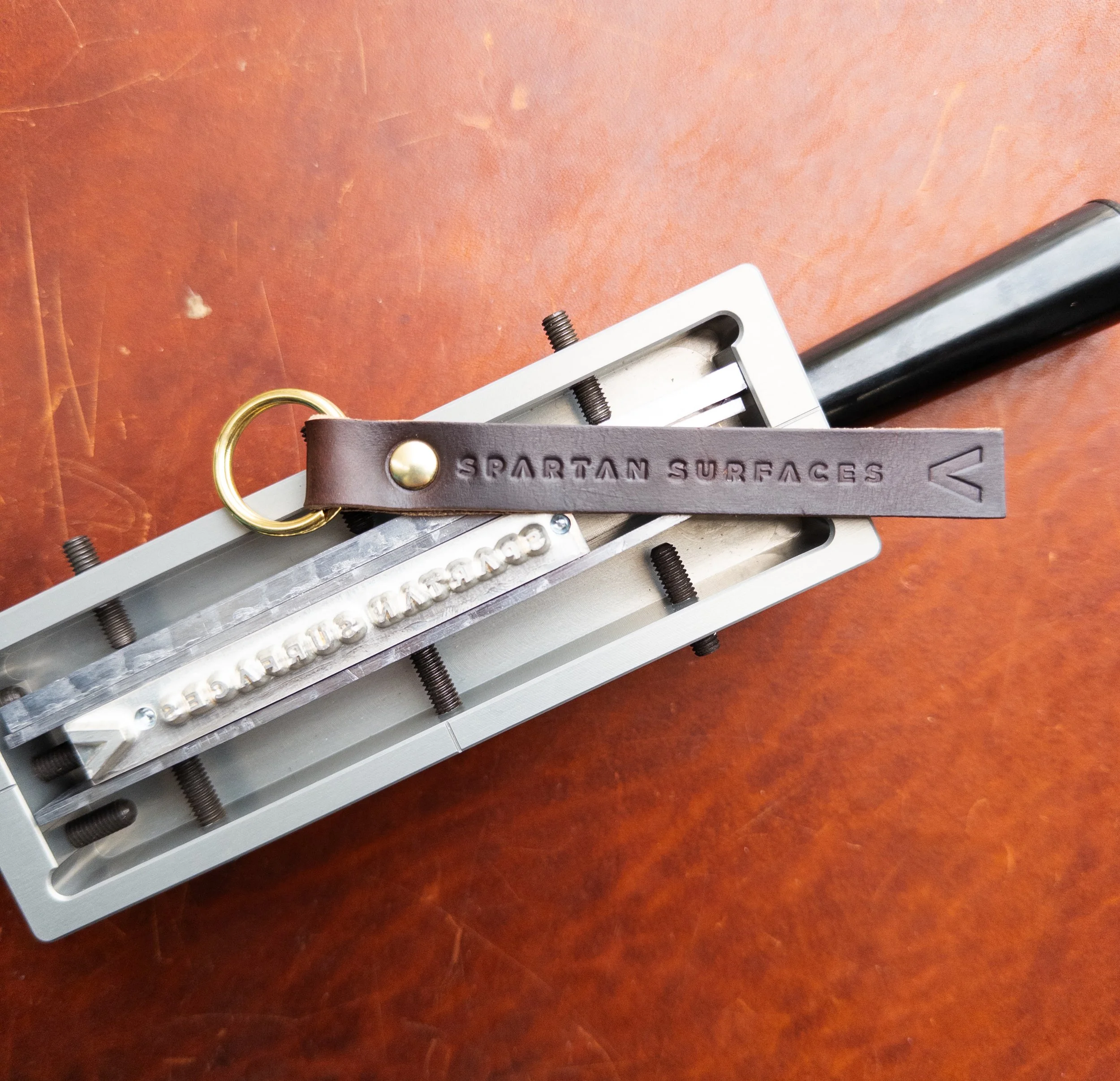 Custom branded keychains for a trade show event.