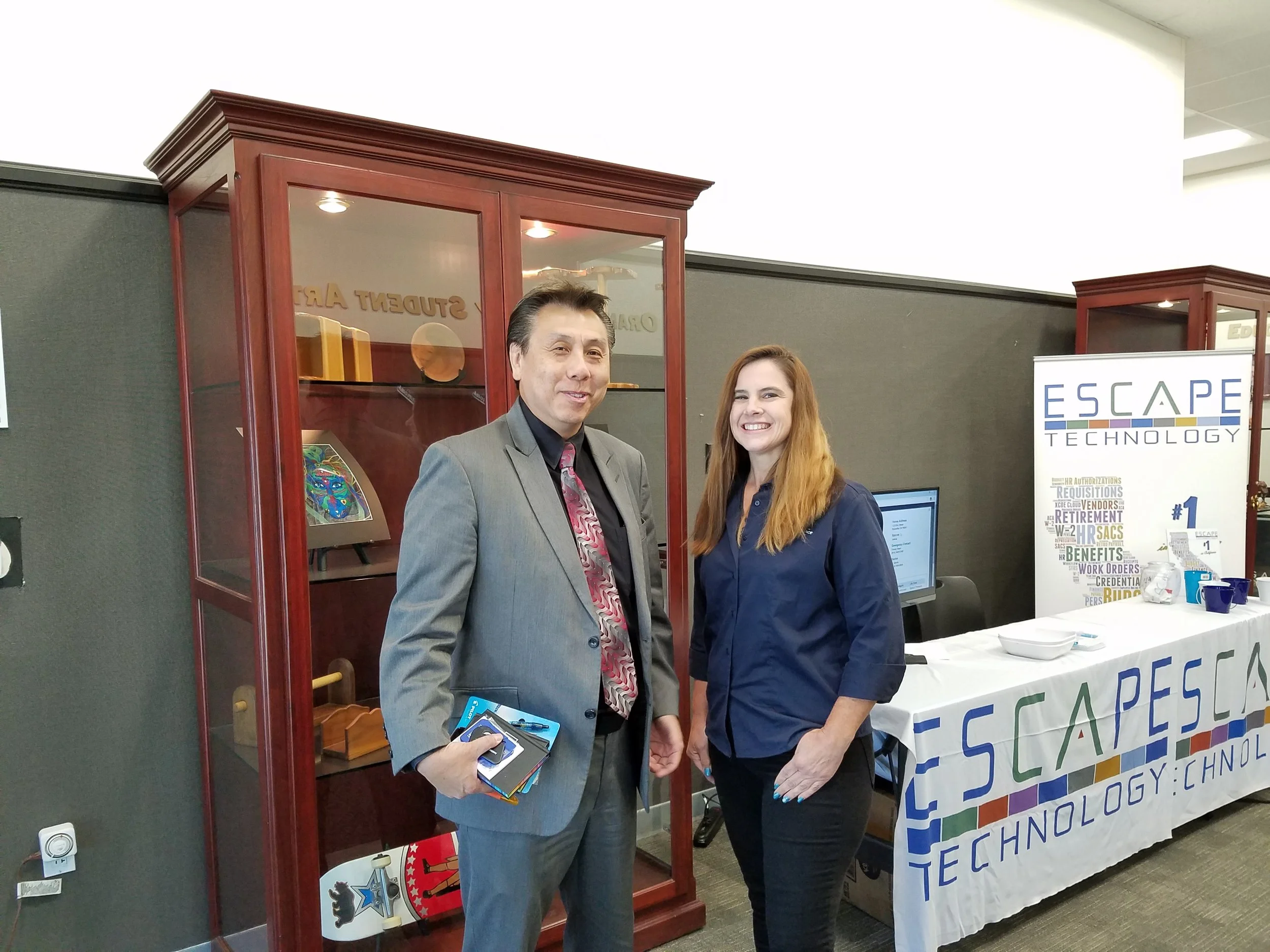 Carl Fong, Chief Technology Officer, OCDE, and Kathy Carlson, Escape Senior Project Manager, chat about the latest school business news.