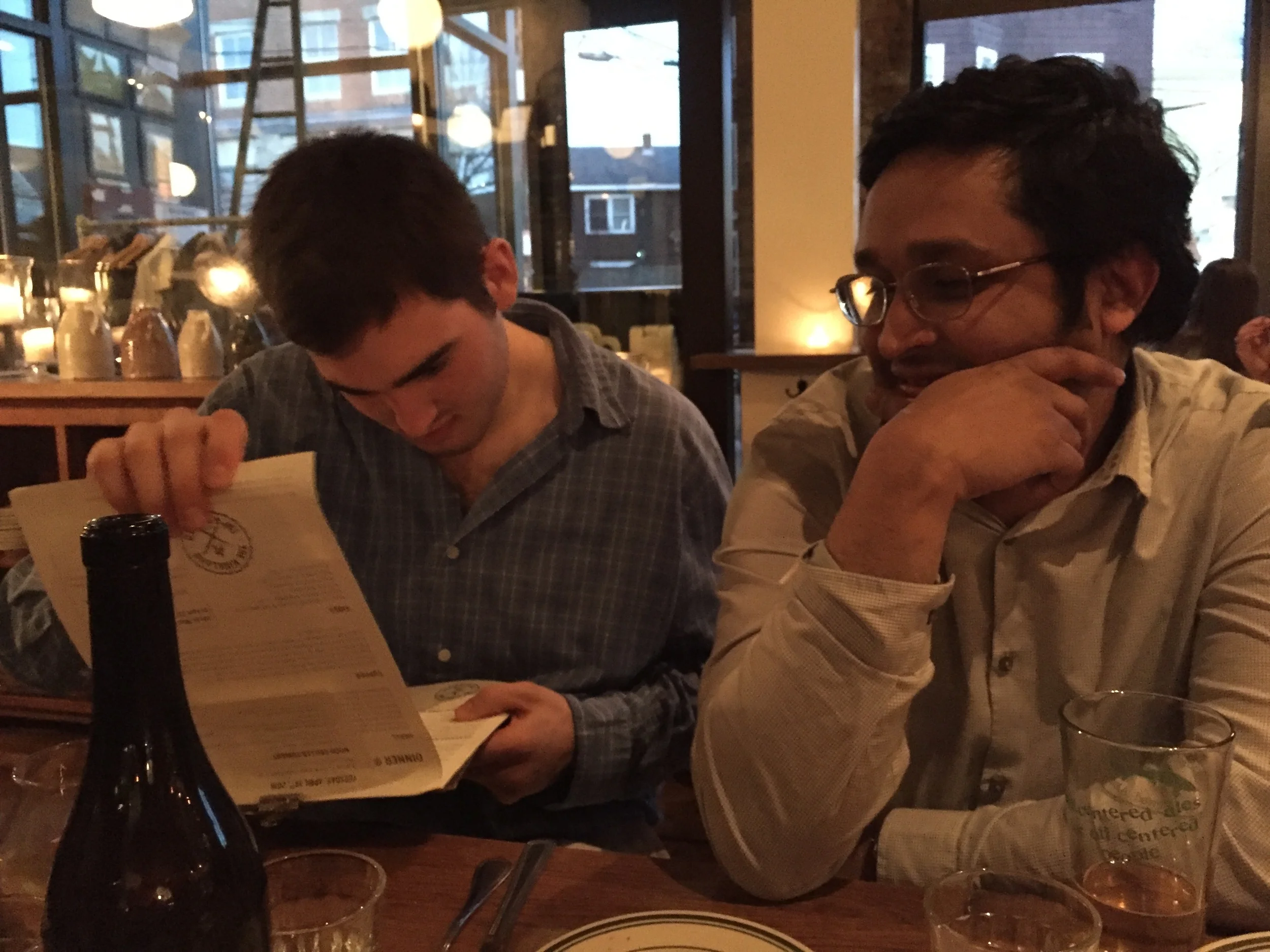 Derrick and Vardhan ponder the menu.