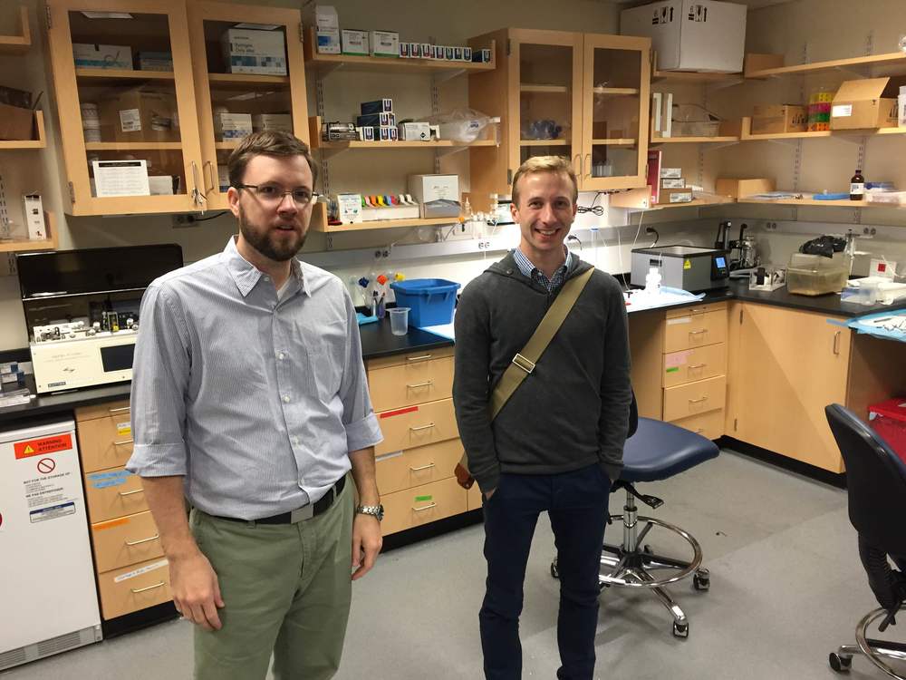 Showing Lukas around his new lab.