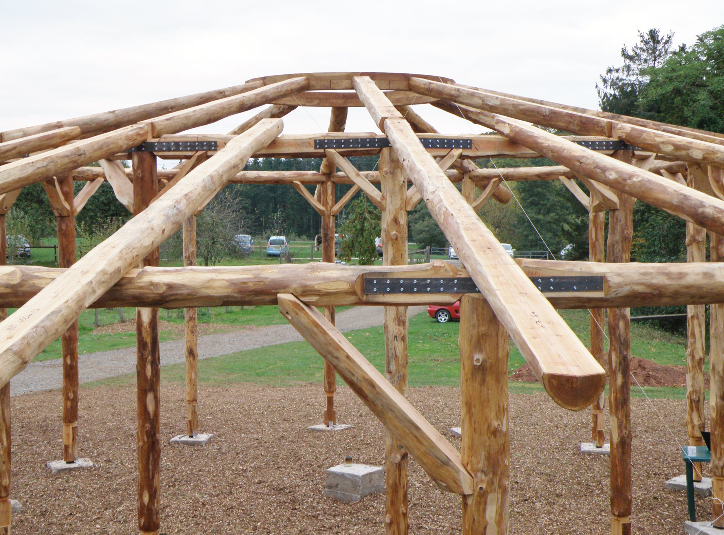 rafters roundhouse hereford longlands farm larch timber frame bristol carpentry round pole timber framing.JPG