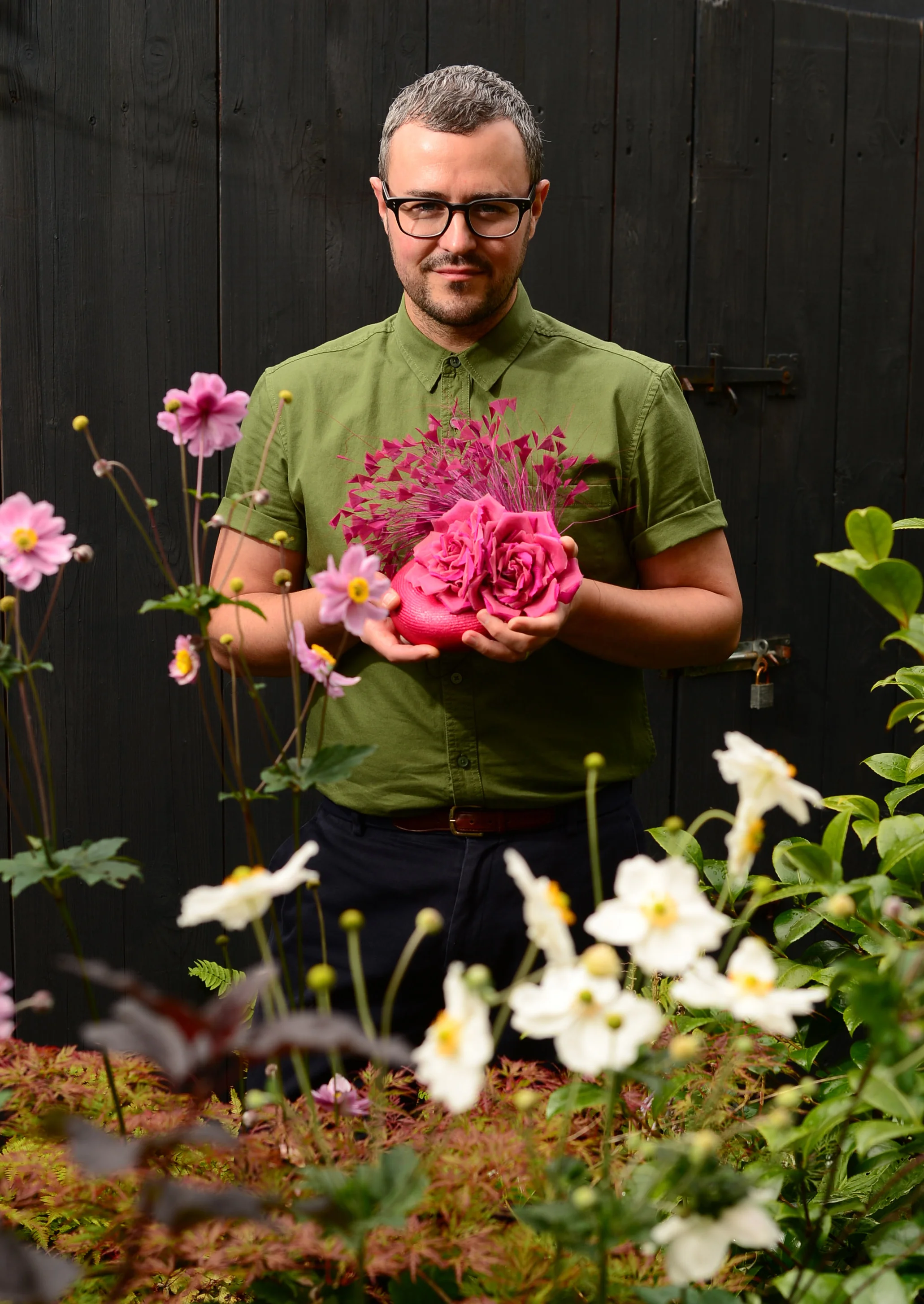 William in his garden, which inspires many of his designs. Photo: The Herald. 