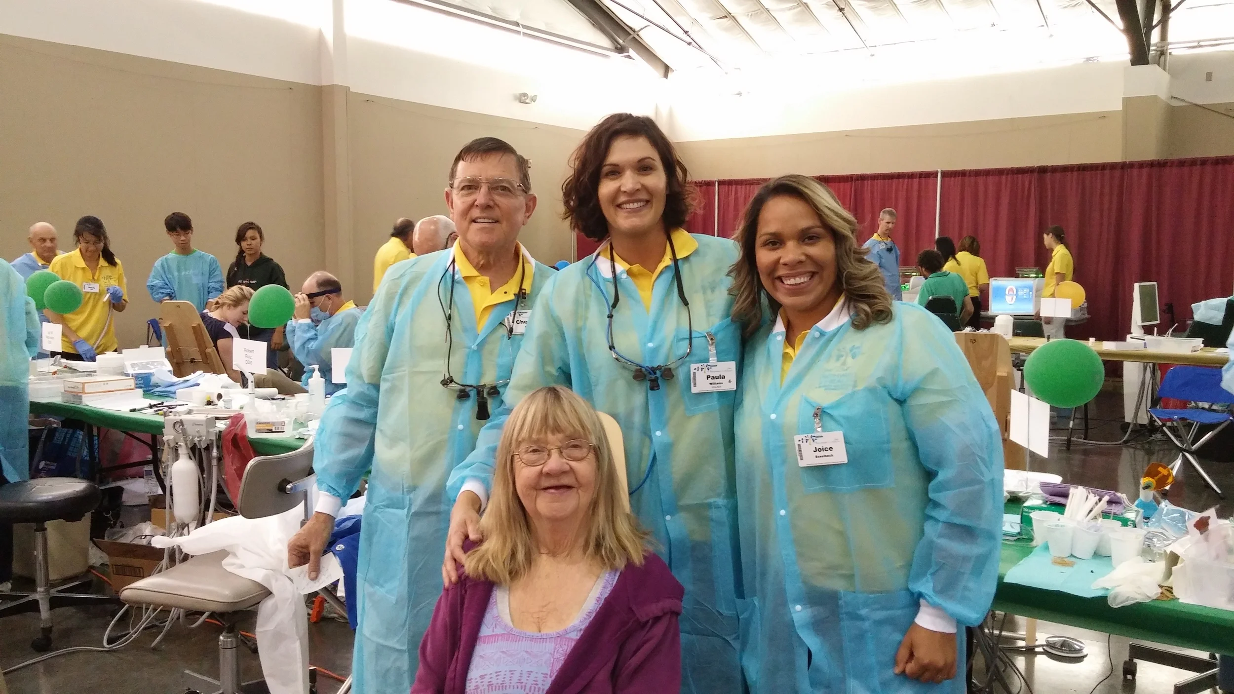 Volunteers and one happy patient at Pathway to Health 2015.