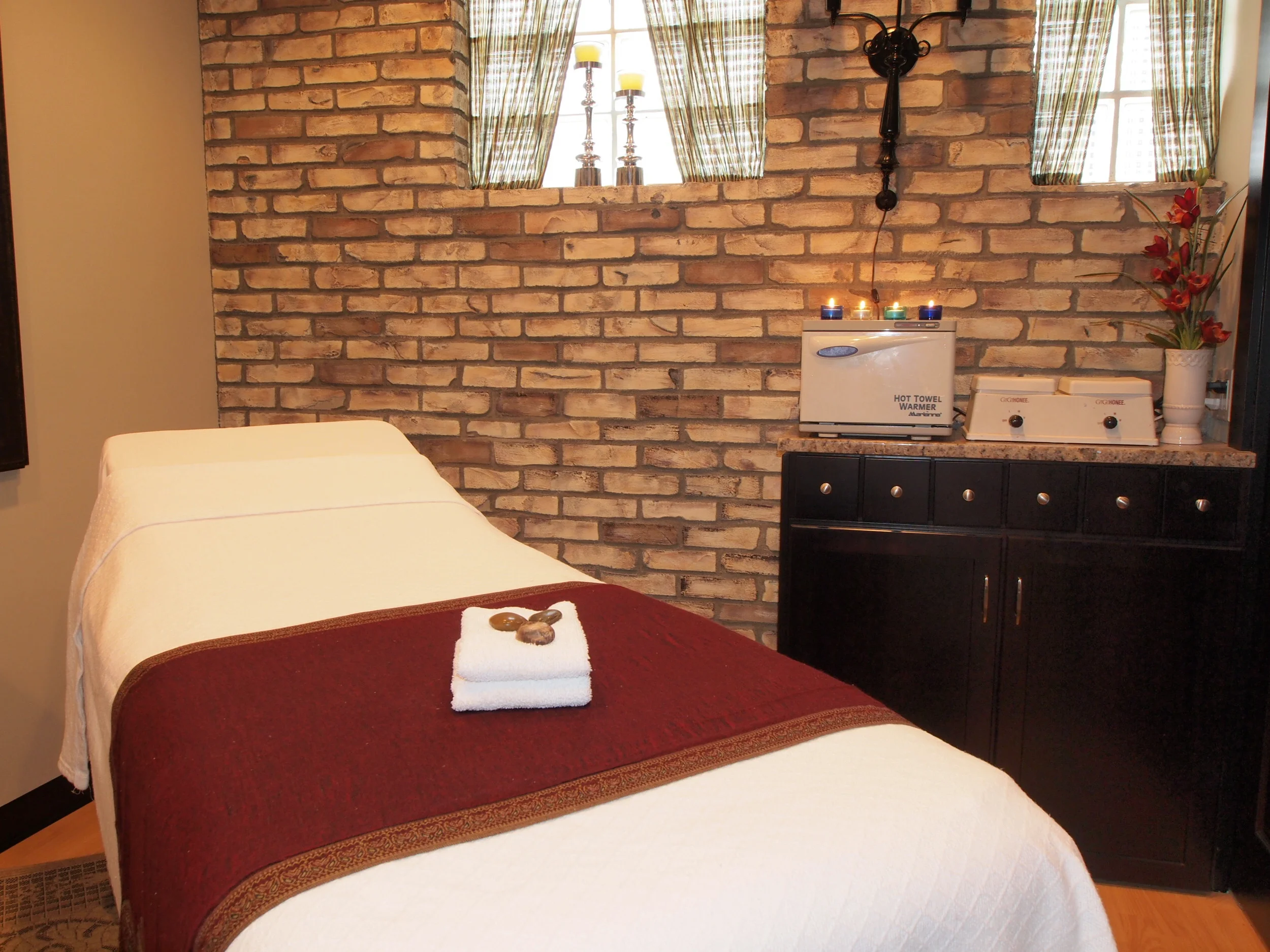 Lyn Phillips is West Michigan Lakeshore's Premiere Salon and Spa. Located in downtown Grand Haven Lyn Phillips has been servicing the Michigan Lakeshore community for over 30 years. Whether you live nearby or are on vacation, come be our guest and pamper yourself with a wide variety of our services. CANCELLATION POLICY Your appointments are very important to all of us at Lyn Phillips Salon. We understand that things come up, therefore we respectfully request at least 24 hour notice for all cancellations. Please realize that things come up and change our laid out plans. For this reason, our policy to give each guest a second chance for the first canceled appointment, without a 24 hour notice. Our guests will then be asked to place a credit card on file in order to book future appointments. In the event that a third appointment is canceled within 24 hours or missed completely, the guest will be charged 100% of the scheduled service. Thank you for giving us the opportunity to serve you!