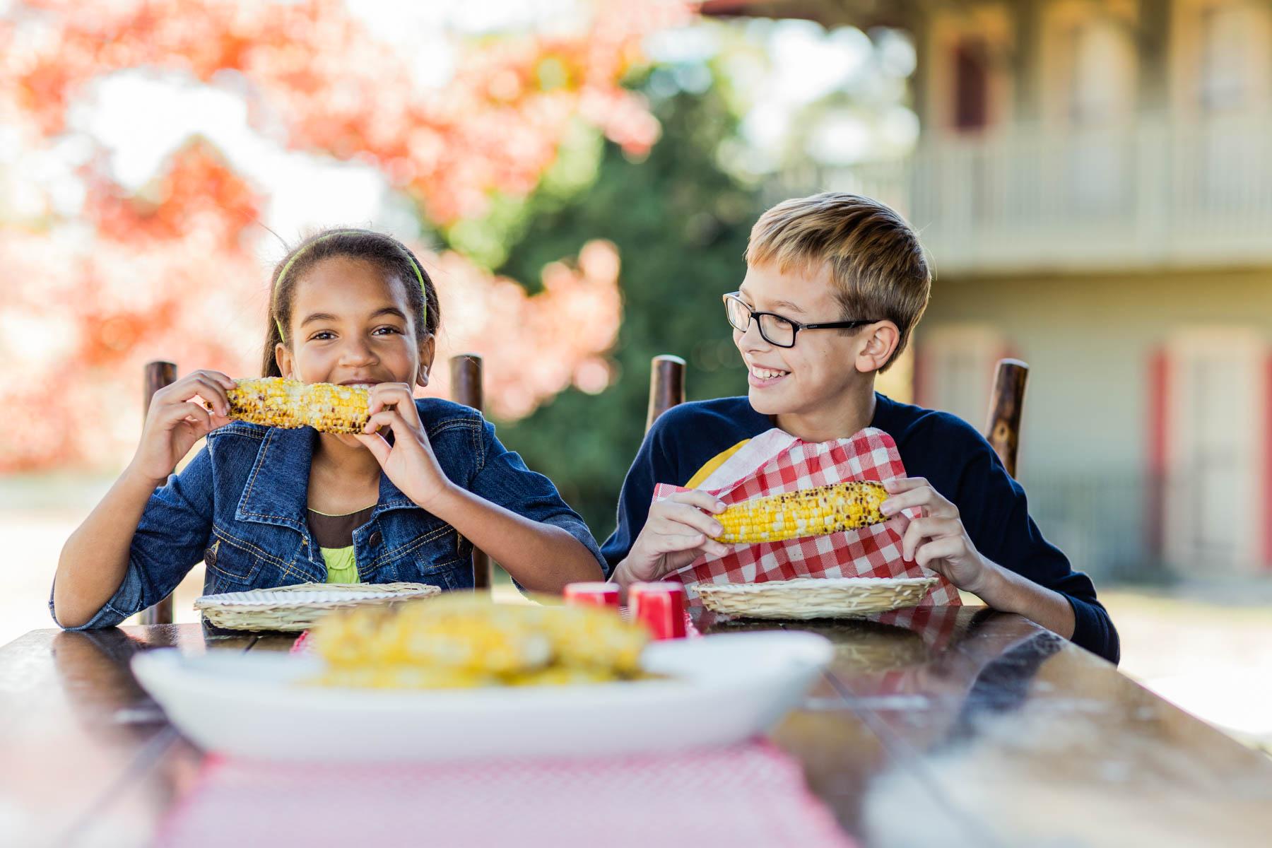 1800x1200x04_KIDS_EATING_CORN_0124.jpg.pagespeed.ic.N5q3peBRvx.jpg