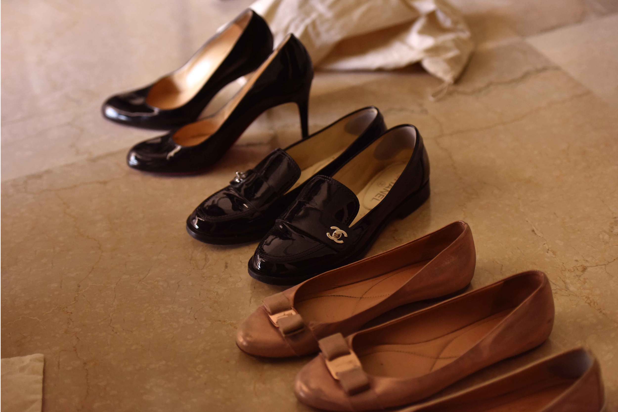Ferragamo ballet flats, Chanel loafers and Loubitons. Image©gunjanvirk