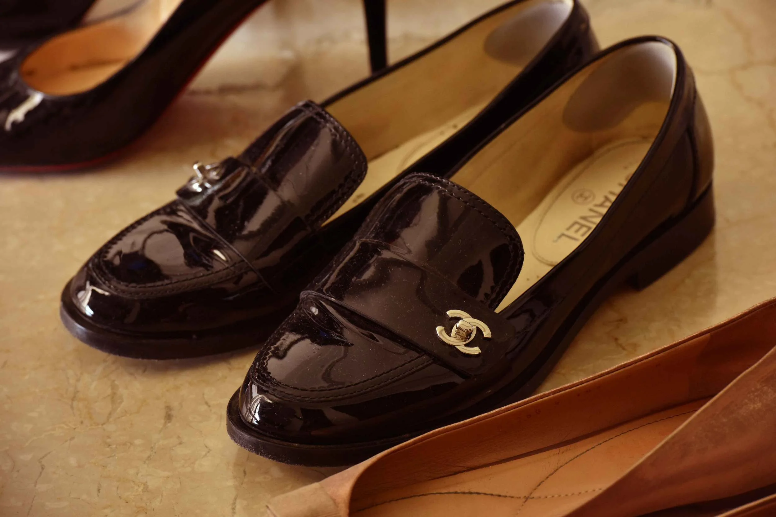 Ferragamo ballet flats, Chanel loafers and Loubitons. Image©gunjanvirk