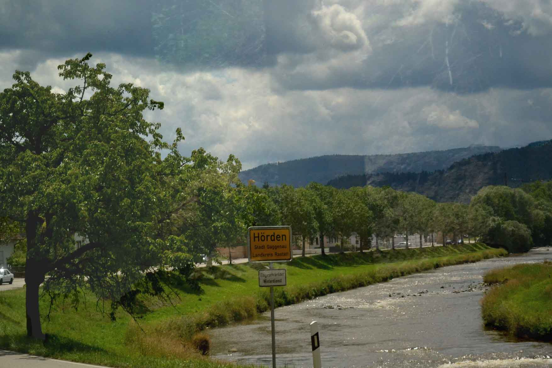 A river flows along the train ride, Germany by train. Image©gunjanvirk
