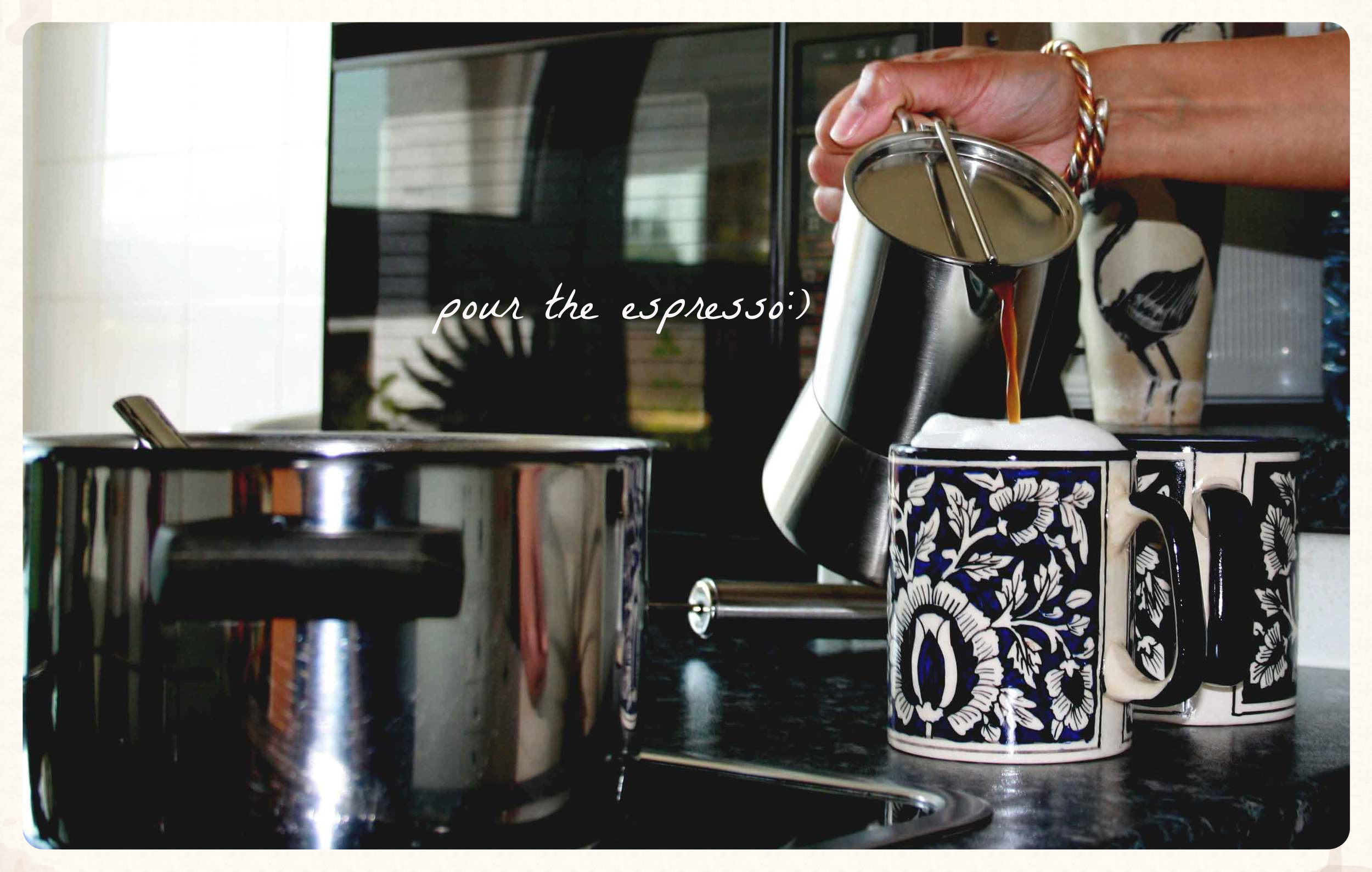 Adding espresso to milk and froth for a perfect cappuccino. Image©gunjanvirk