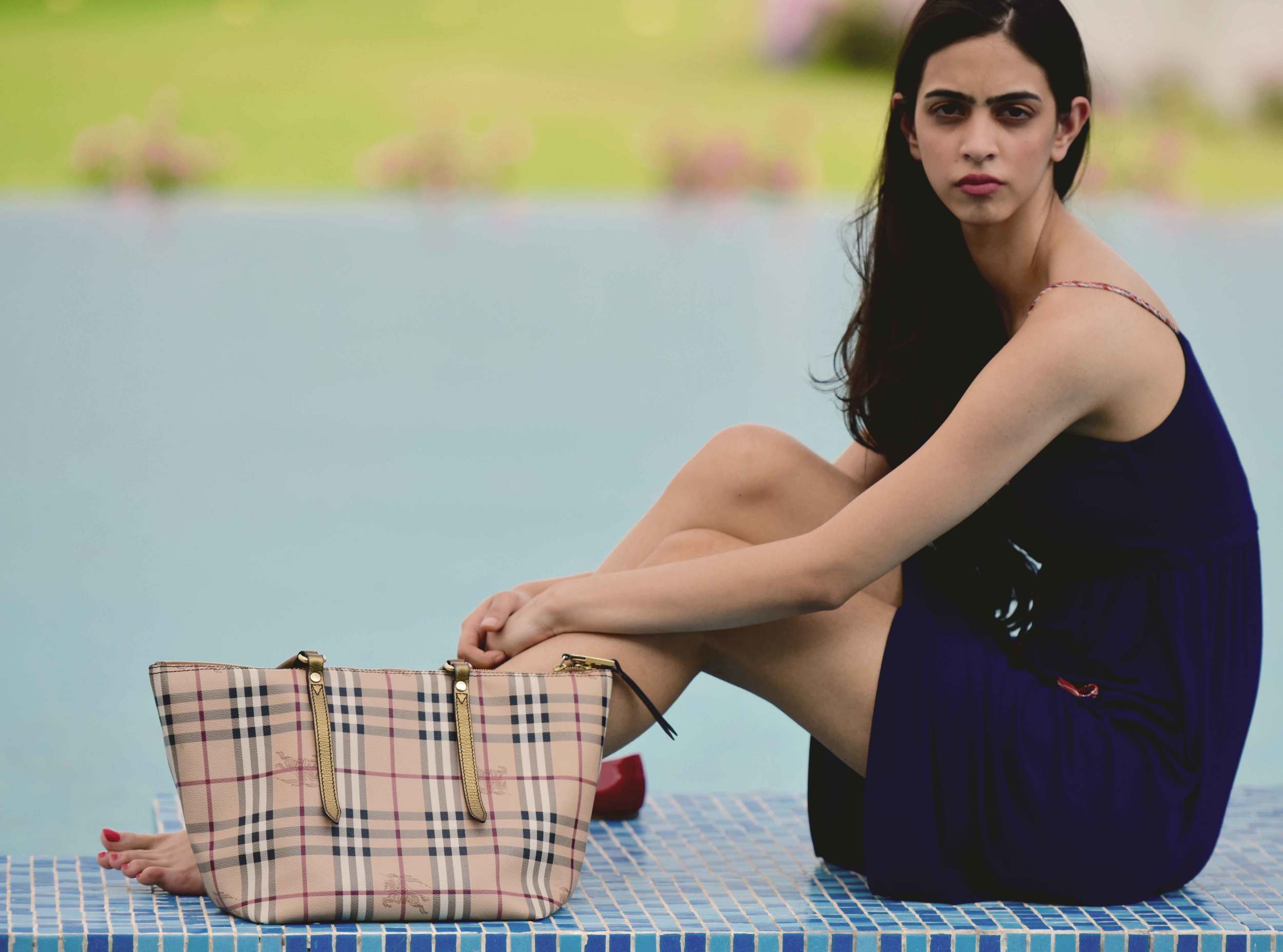 My friend Mannat in a Zara dress, Burberry tote and Ferragamo ballet flats. Image©gunjanvirk