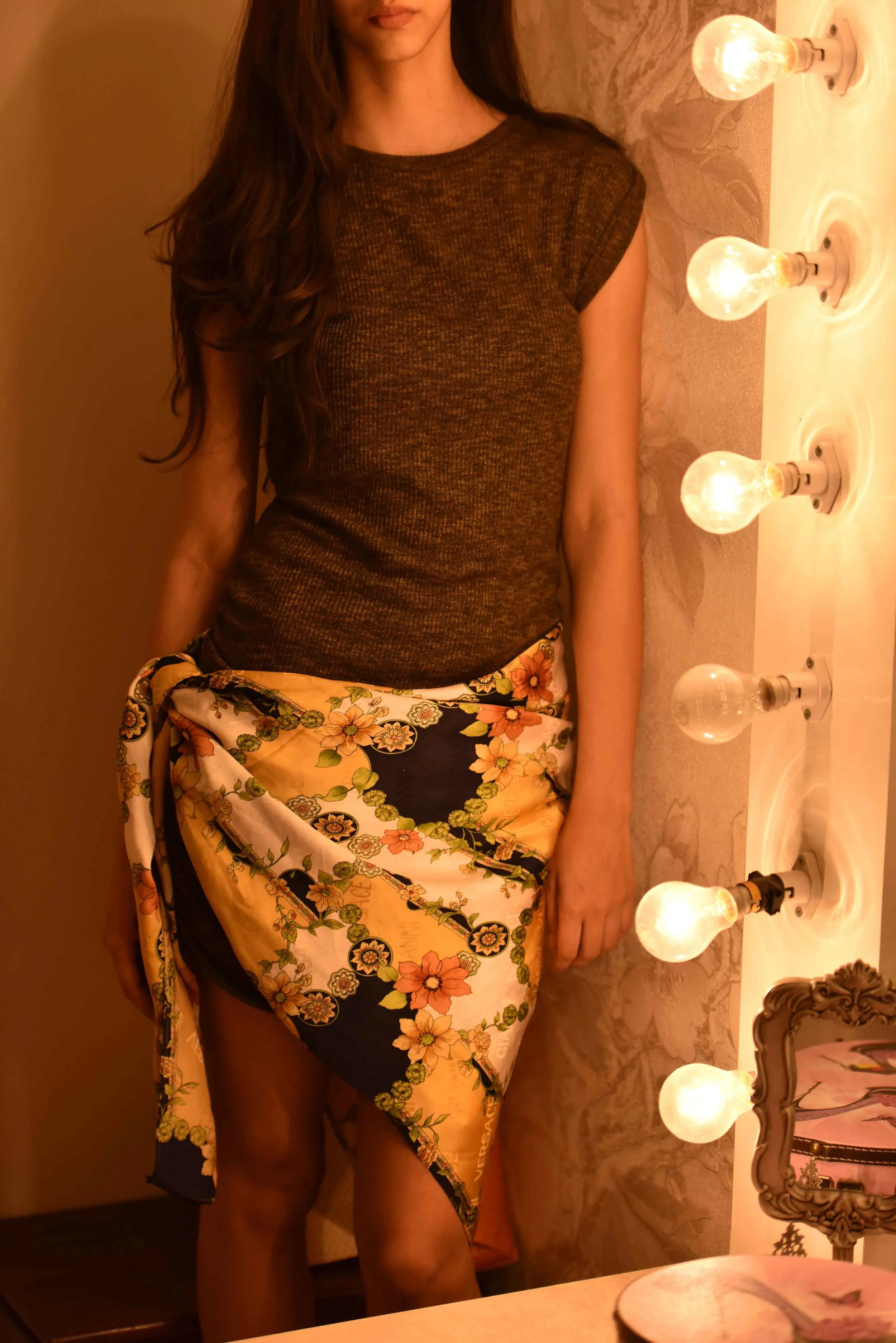 A basic sheath dress with a Versace scarf tied as a sarong. Model: Mannat Dhaliwal, Image©sourcingstyle.com