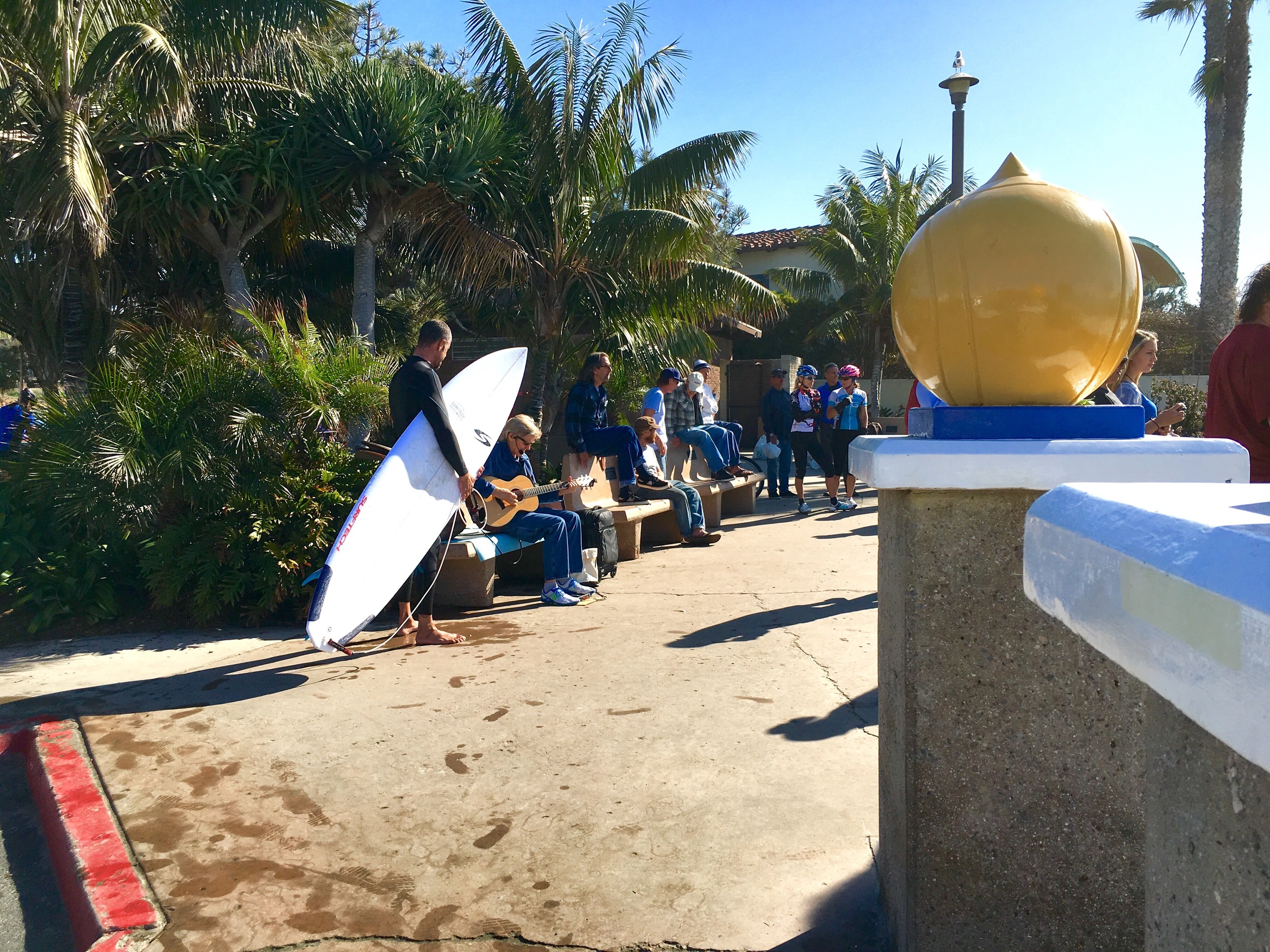 People enjoying a nice sunny day, Swamis beach, Encinitas, CA. Image©gunjanvirk, camera iPhone 6s Plus 