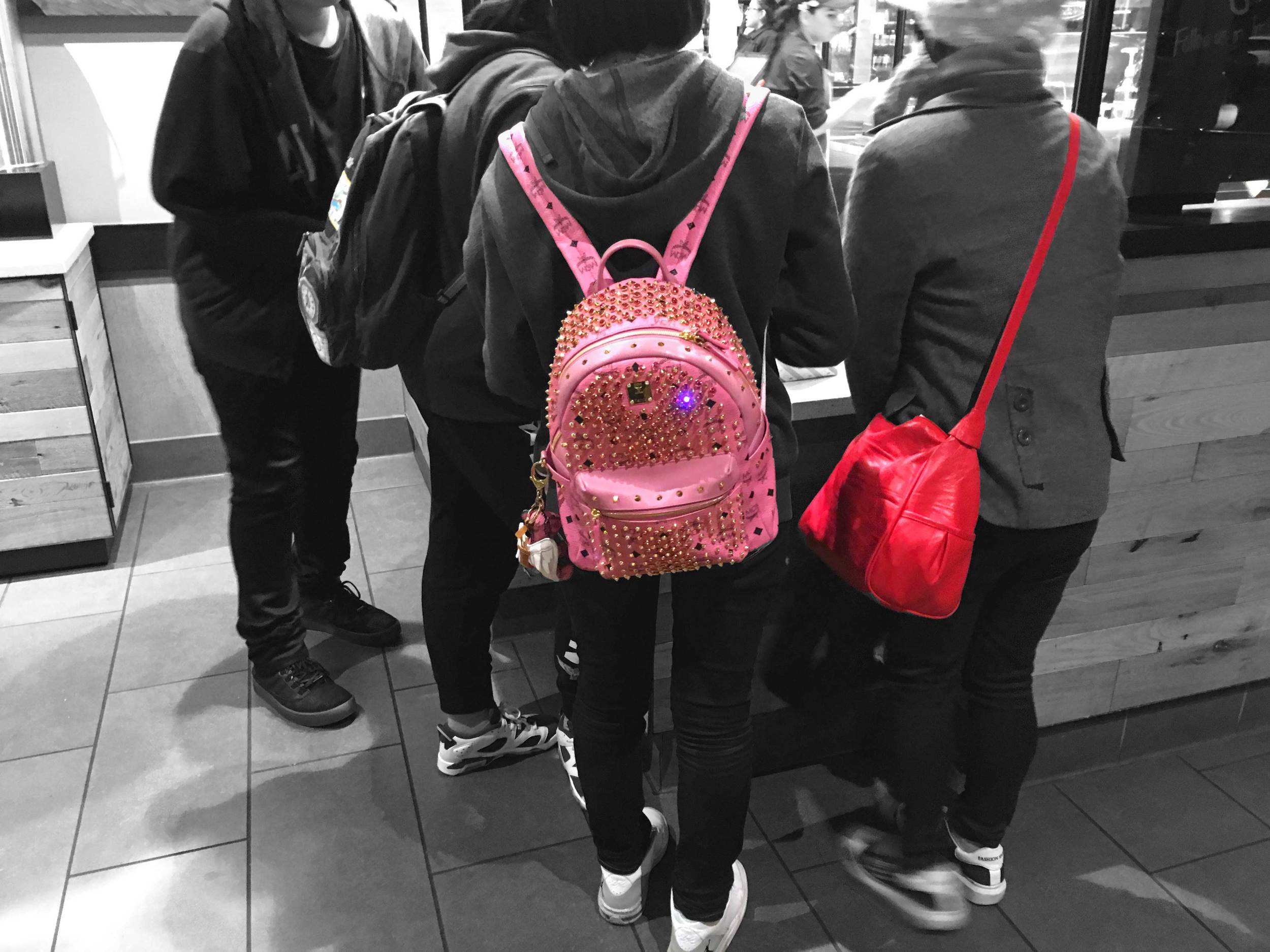 Trendspotting-bright and colorful bags!! I love your bags! At Starbucks ordering my hot chocolate with cream....so delicious! Citadel Outlets, LA, CA, USA. Image©gunjanvirk