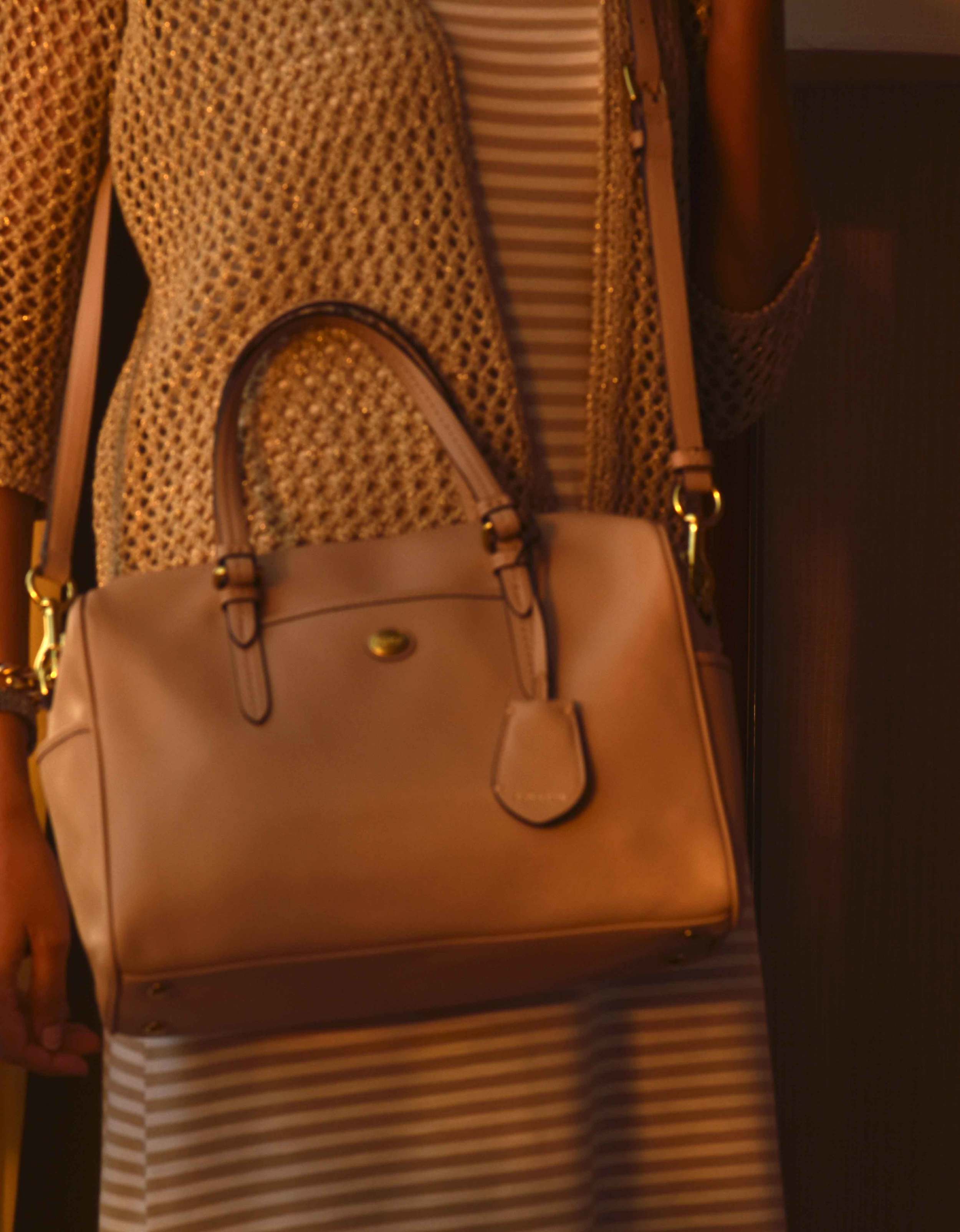 My Chicos striped summer dress, a Chicos bolero jacket, a neutral color Coach bag. Image©sourcingstyle.com