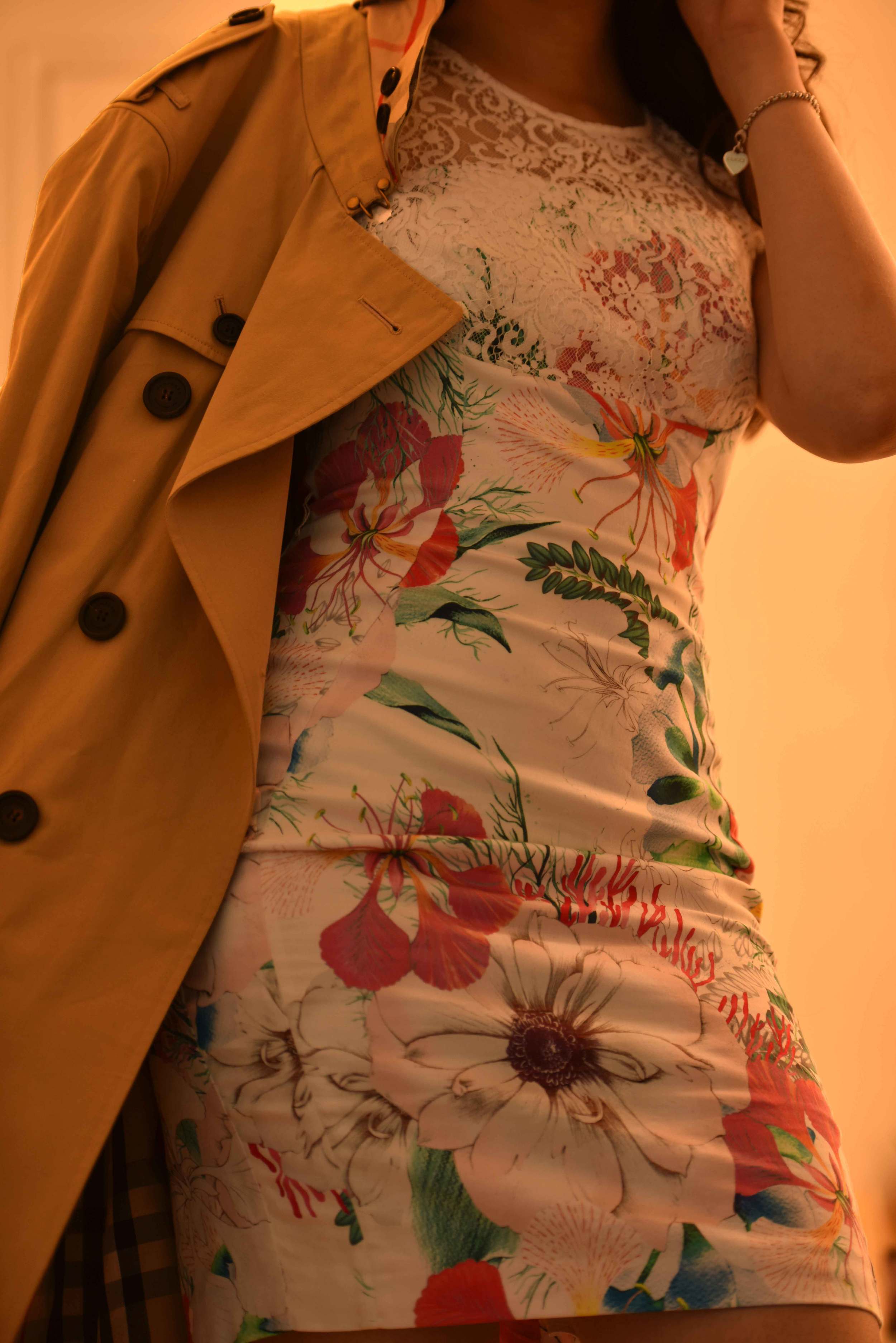 A floral printed sheath dress, a classic Burberry trench coat. Image©sourcingstyle.com