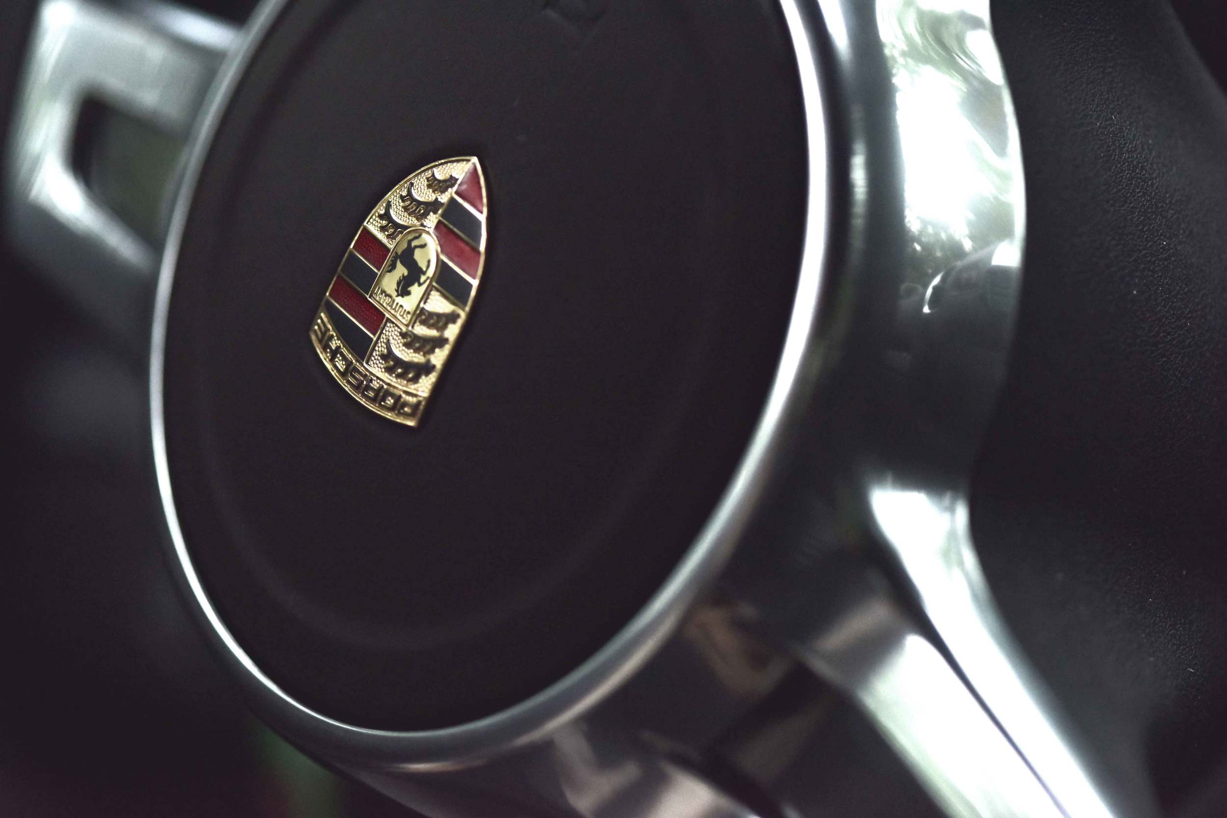 Porsche car, steering wheel Porsche. Image©sourcingstyle.com
