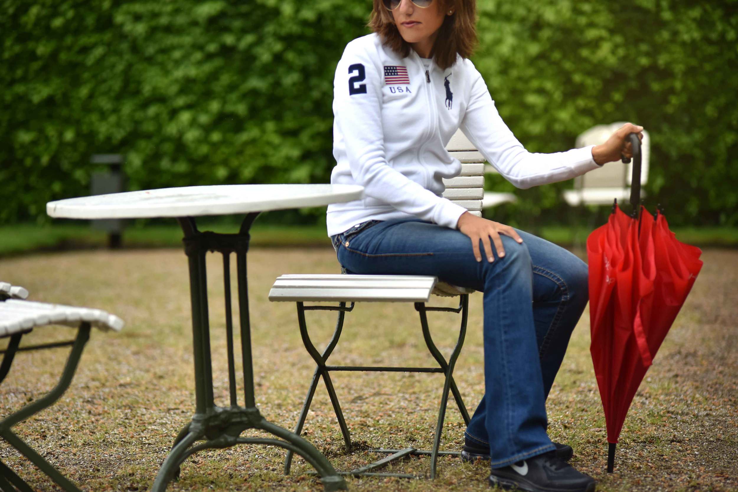 White Ralph Lauren Polo jacket, True Religion jeans, Nike sneakers, Gönneranlage, historic park, Baden Baden, Germany. Image©sourcingstyle.com
