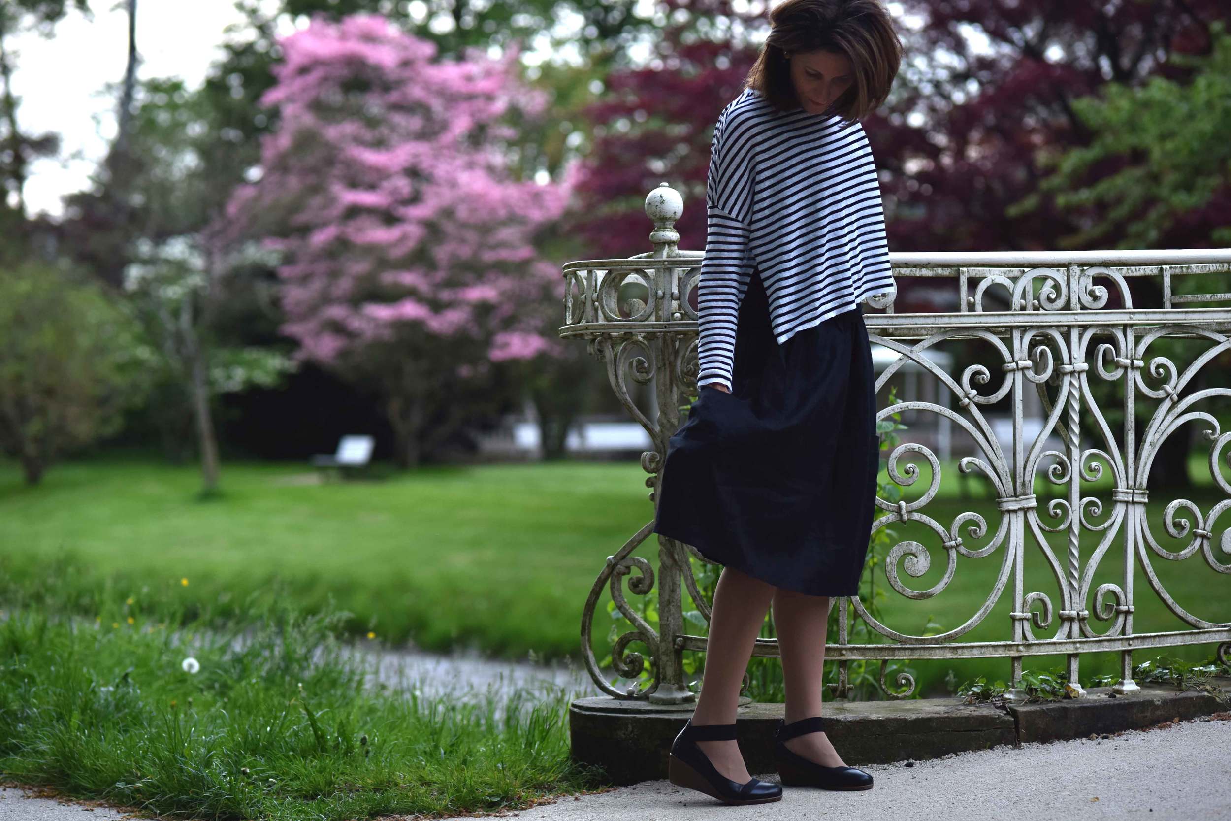 Eileen Fisher boxed top, Eileen Fisher oval skirt, bridge on Oos river, Bellevue Brücke, Baden Baden, Germany. Image©sourcingstyle.com