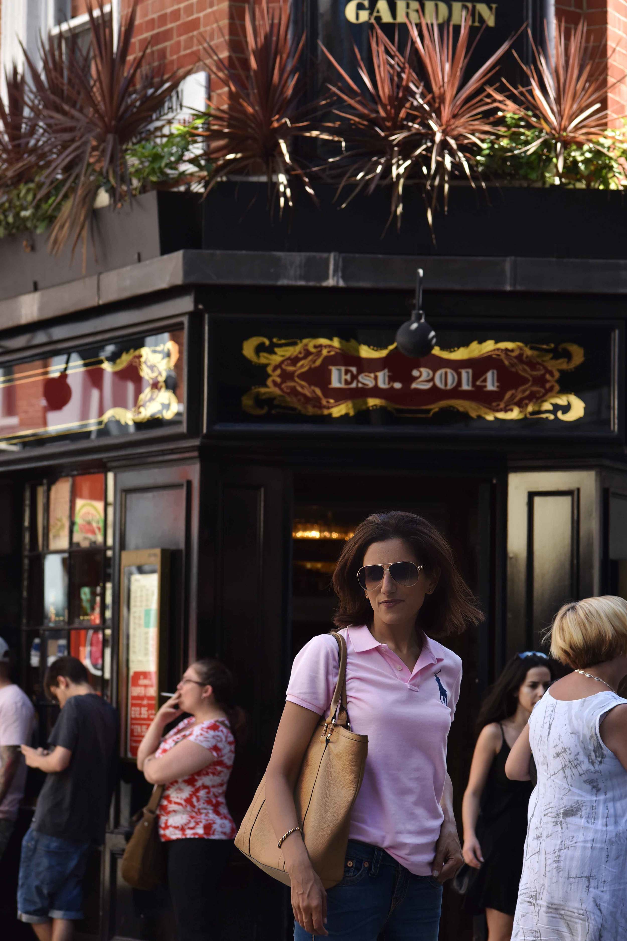 Ralph Lauren skinny polo tee, in front of Jamie's Kitchen, London. Image©sourcingstyle.com