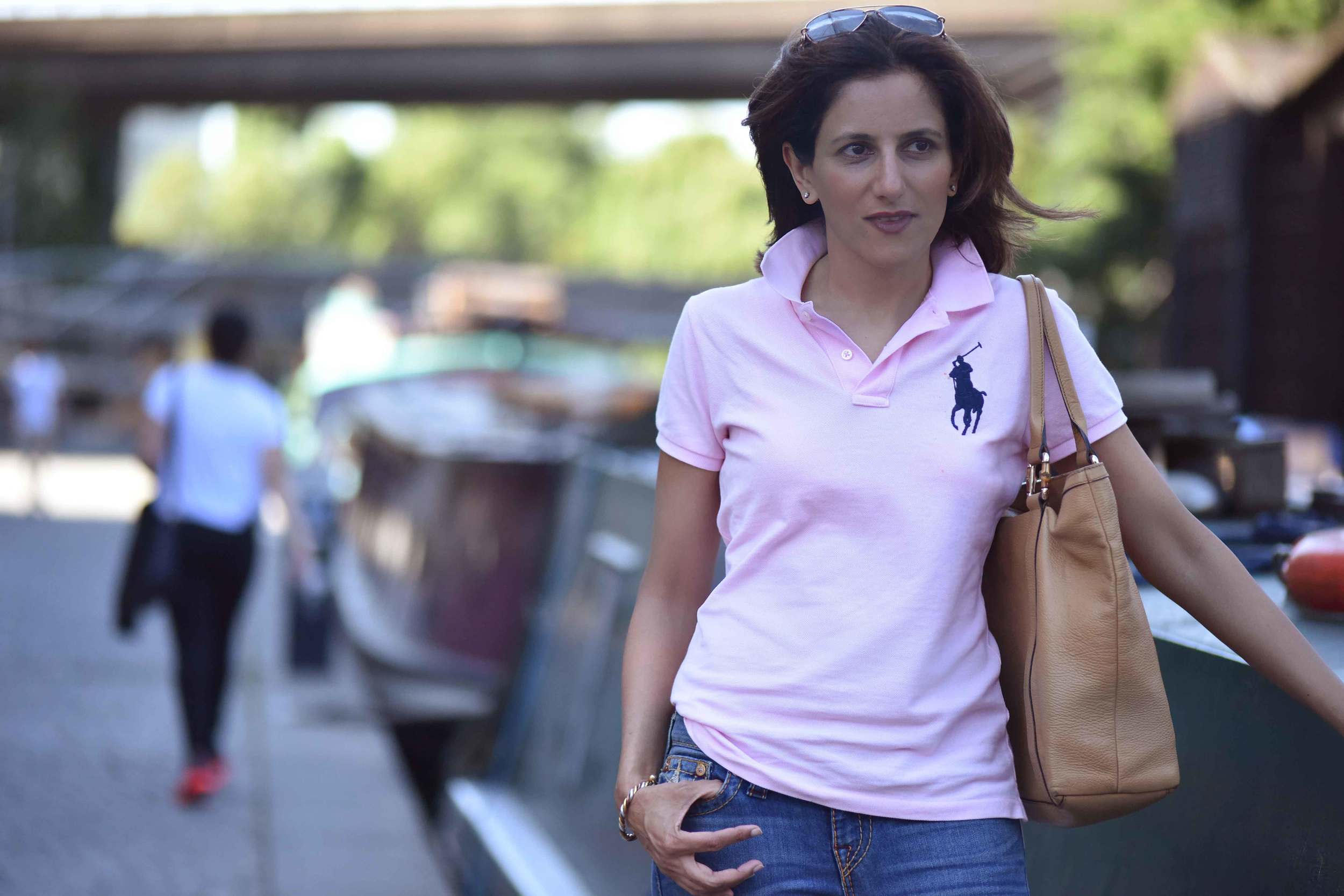 Ralph Lauren skinny polo tee, True Religion jeans, Gucci tote bag, London. Image©sourcingstyle.com