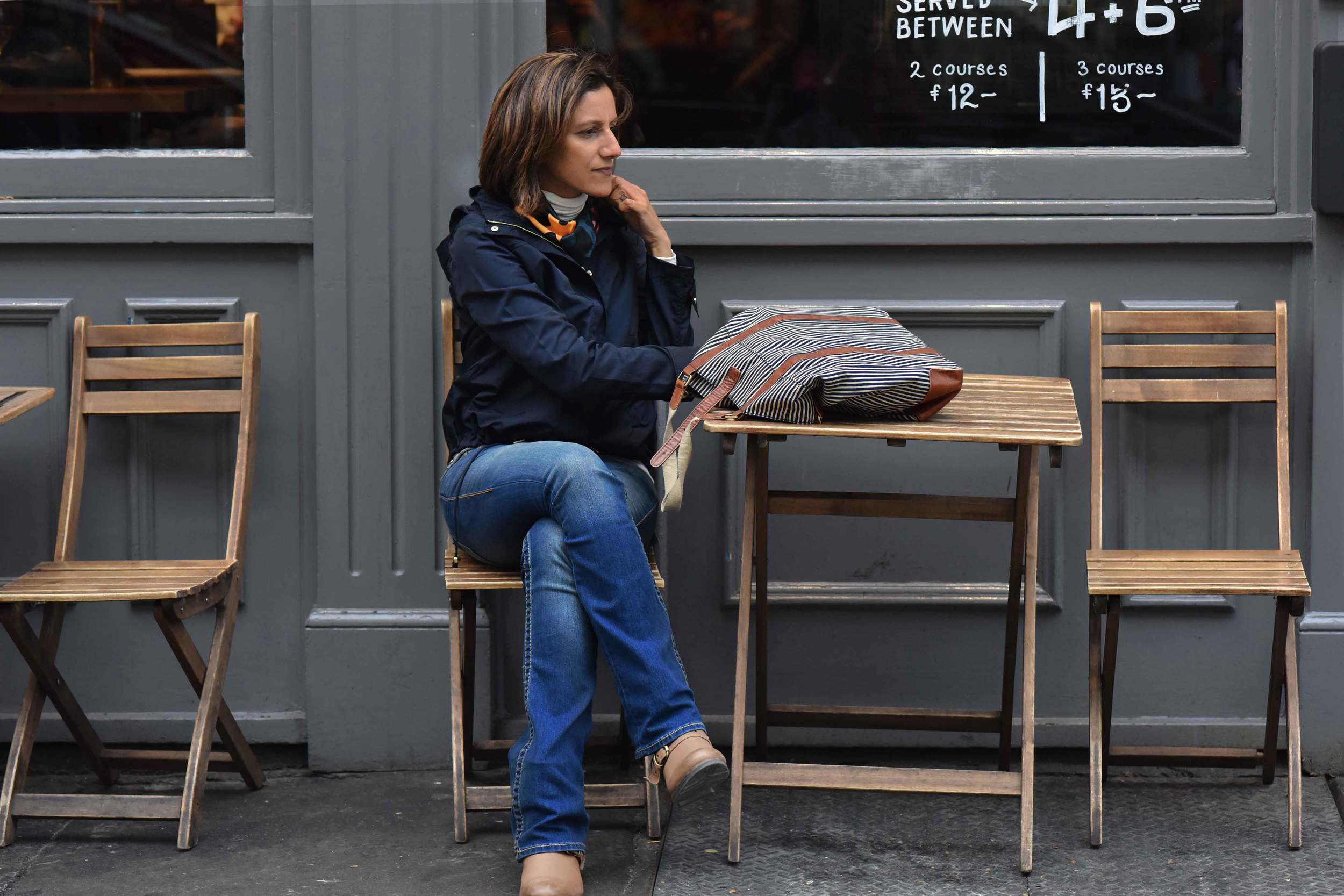 Zara water repellent jacket, Ralph Lauren polo sweater, Zara printed pocket square, Zara bandana print umbrella, True Religion jeans, Uggs boots, Covent Garden, London, UK. Image©sourcingstyle.com