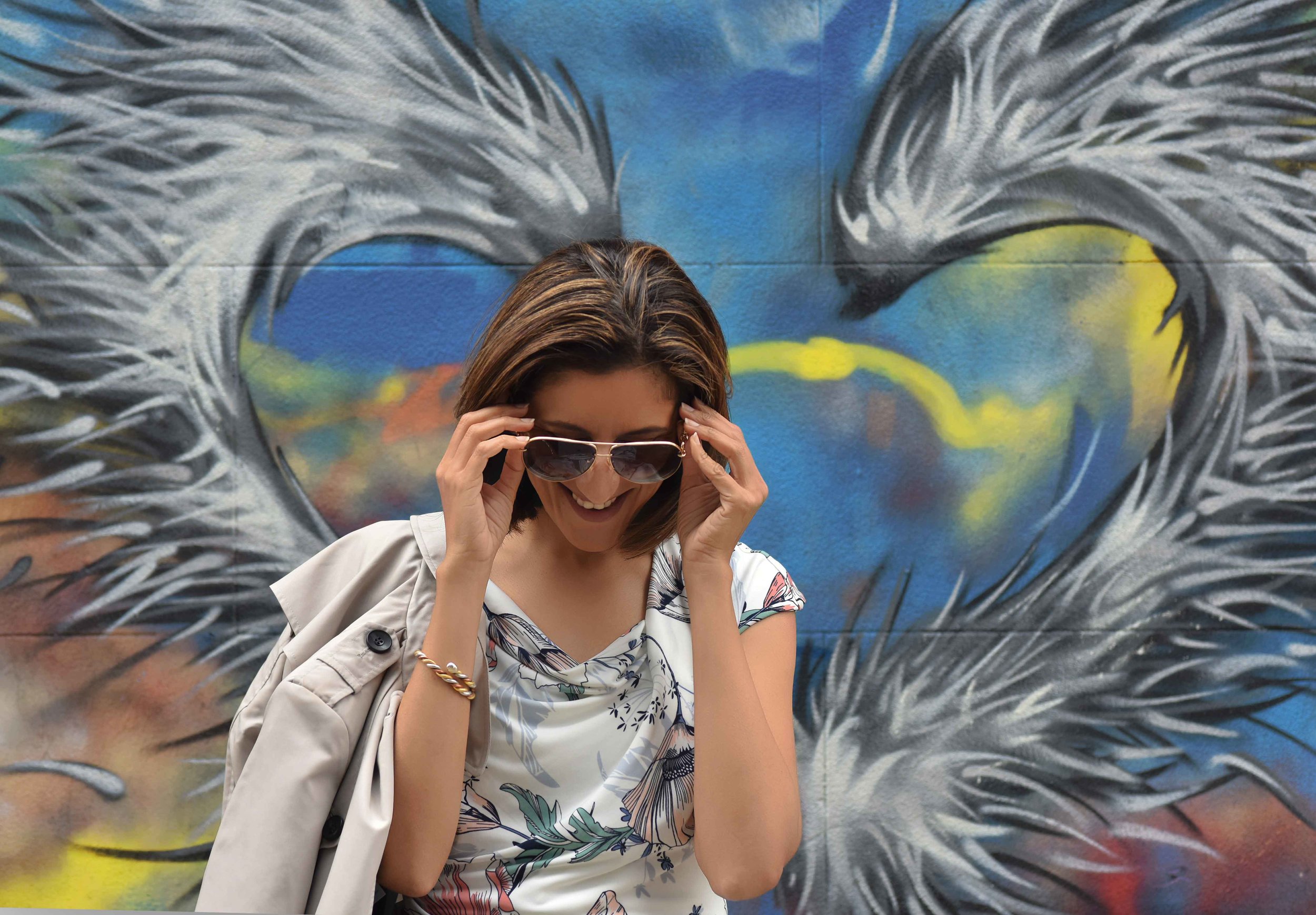 MNS dress, MNS trench, Gucci sunglasses, Graffiti artwork, street fashion, street art, Bricklane, Shoreditch, London, U.K. Photo: Nina Shaw, Image©sourcingstyle.com