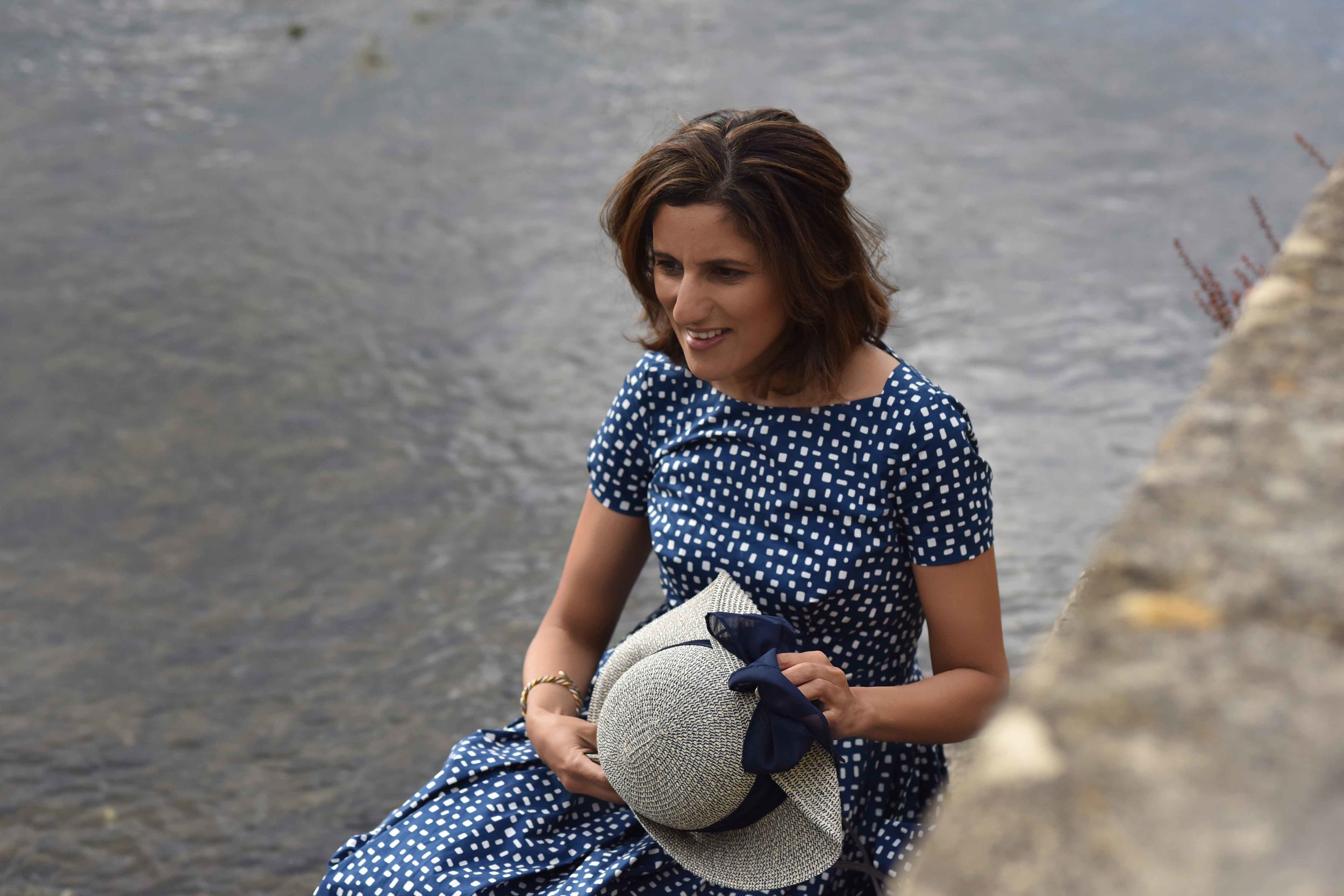 Prada dress, River Coln, Bibury, Cotswold, England. Image©sourcingstyle.com