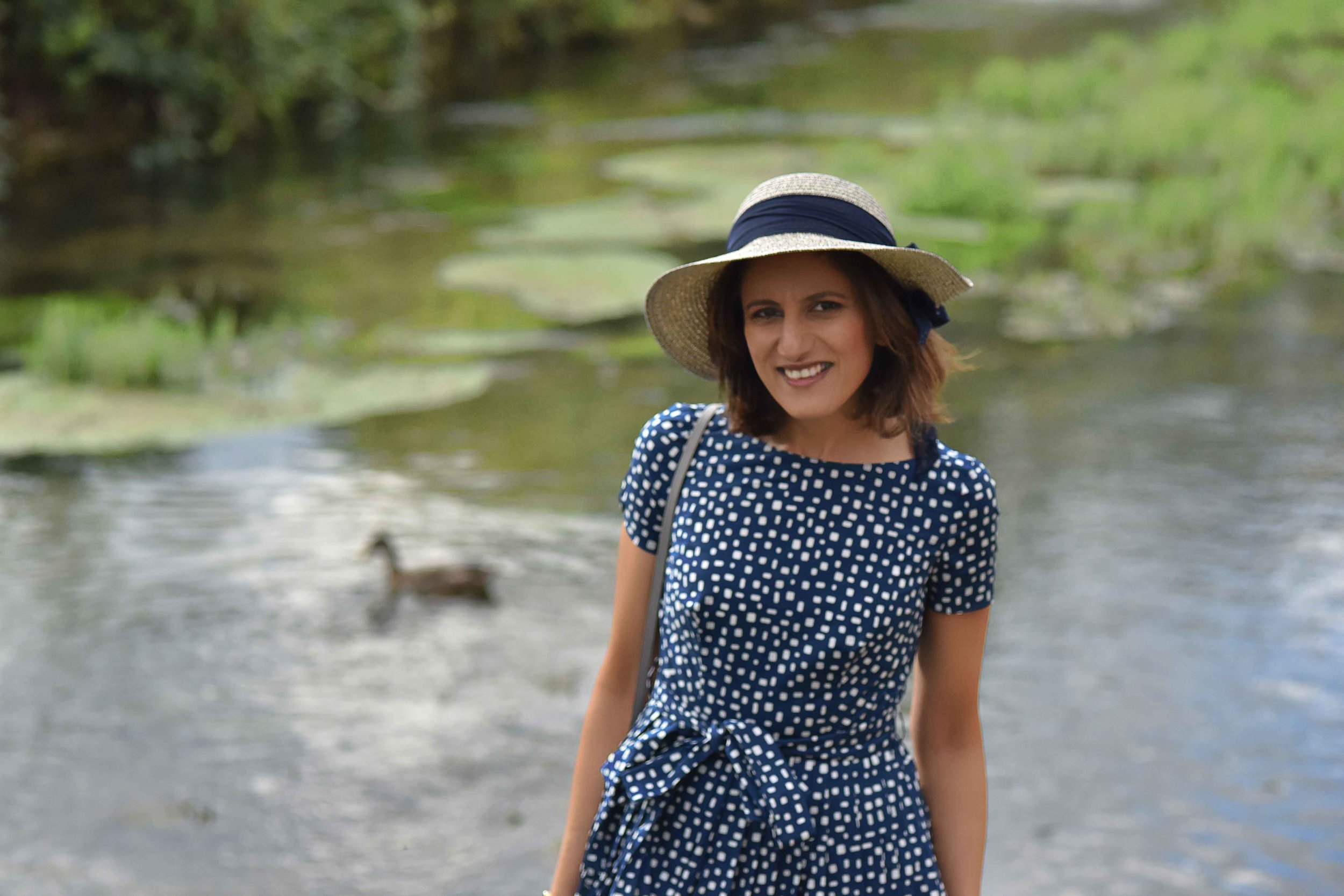 Prada dress, River Coln, Bibury, Cotswold, England. Image©sourcingstyle.com