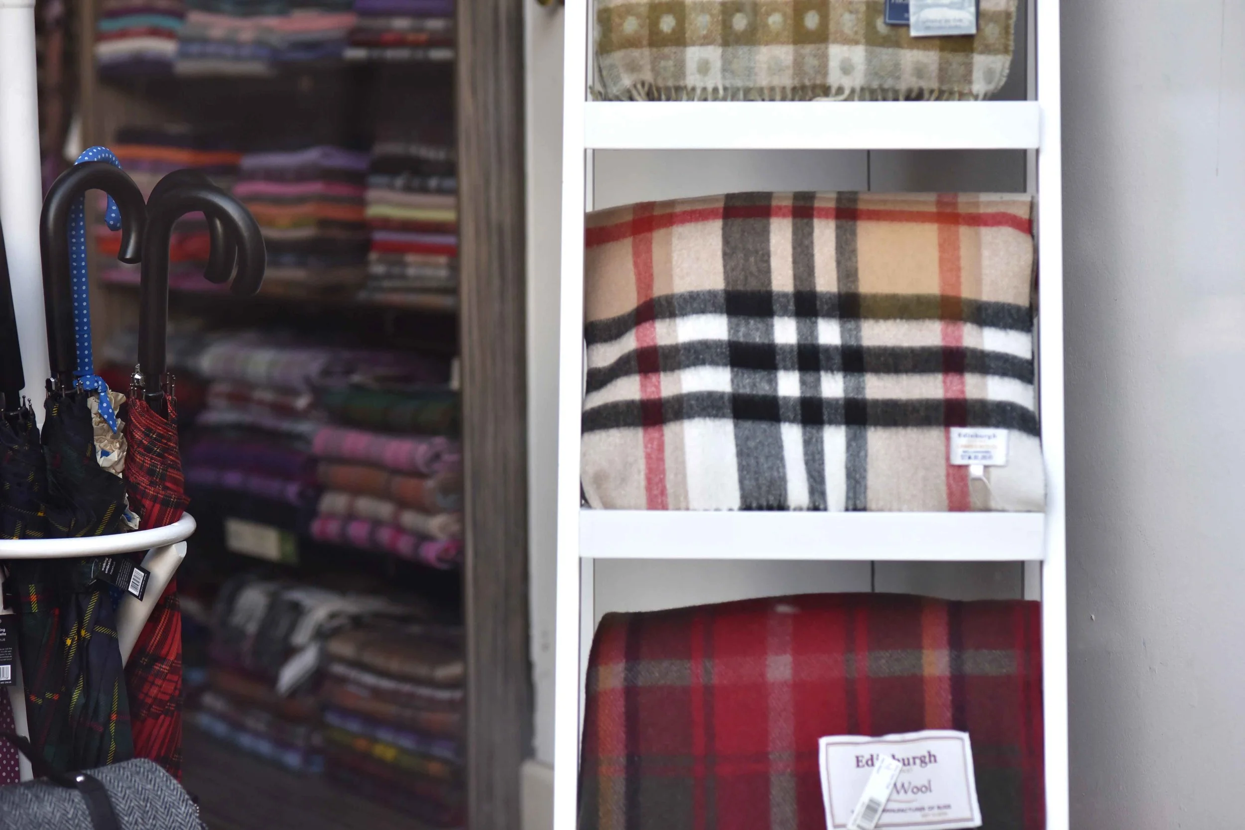 Shopping at Edinburgh Old Town, Scottish checks, Edinburgh, Scotland. Image©sourcingstyle.com