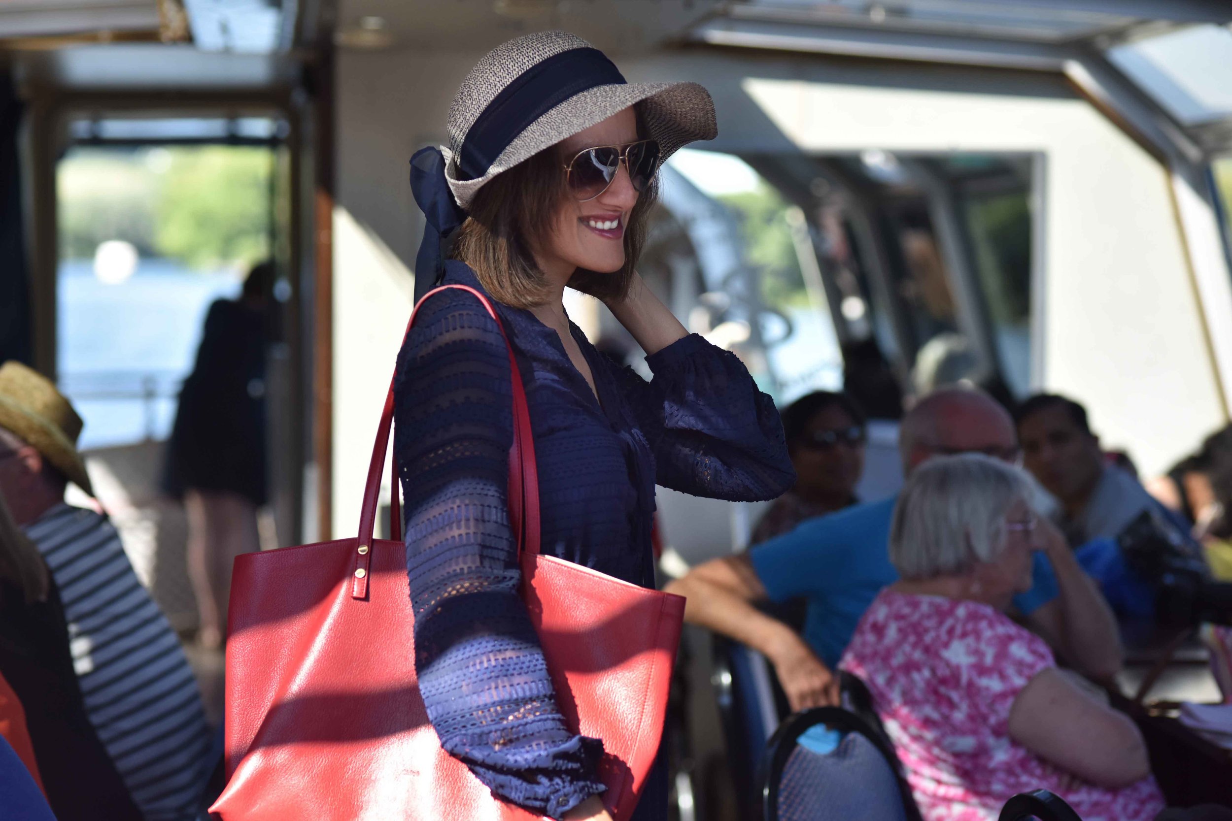 Henley on Thames river cruise, Karen Millen dress, red Chloé tote bag, Marks & Spencer hat, Gucci shades. Image©sourcingstyle.com