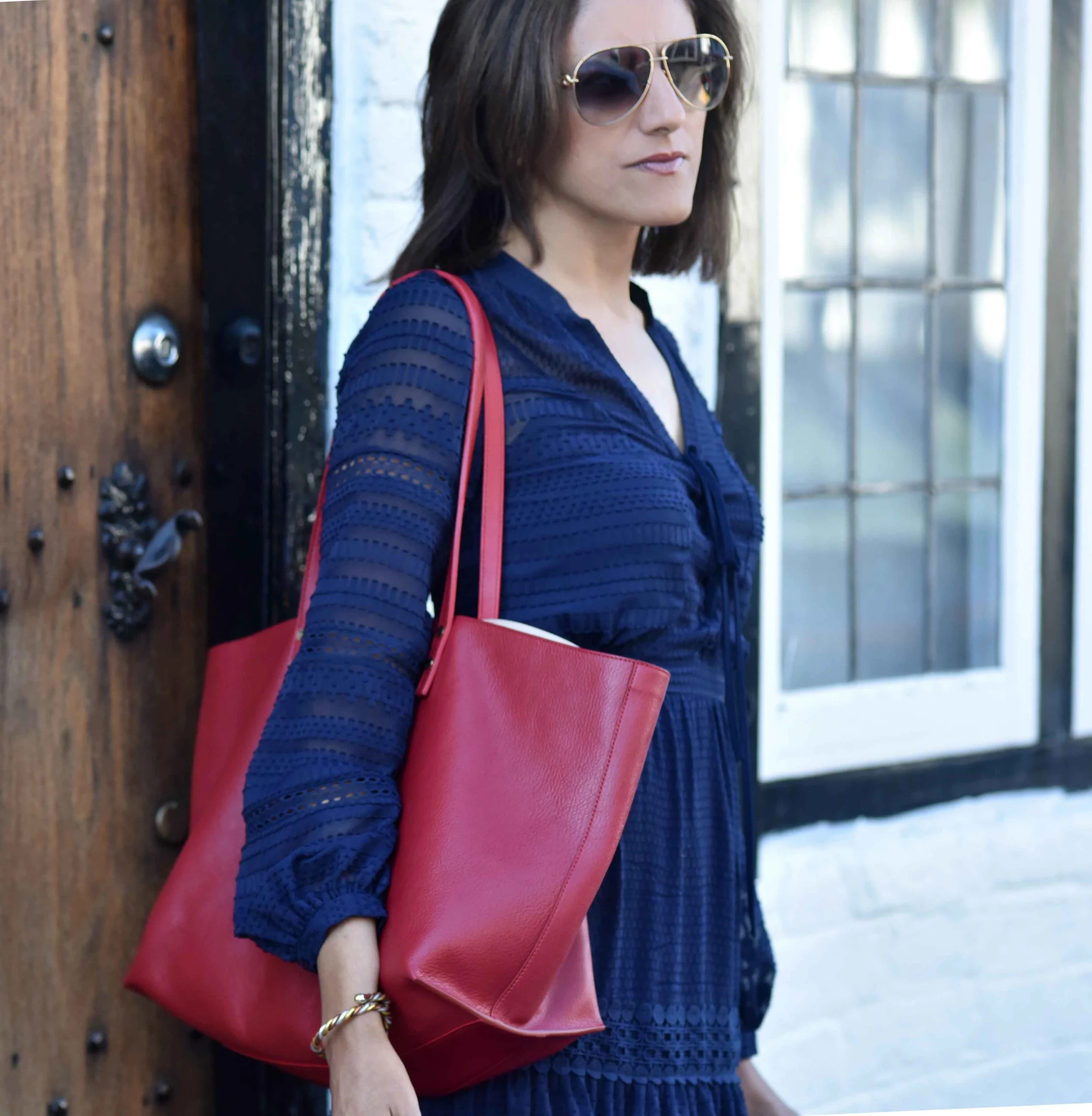 Henley on Thames, Karen Millen dress, red Chloé tote bag, Gucci shades. Image©sourcingstyle.com