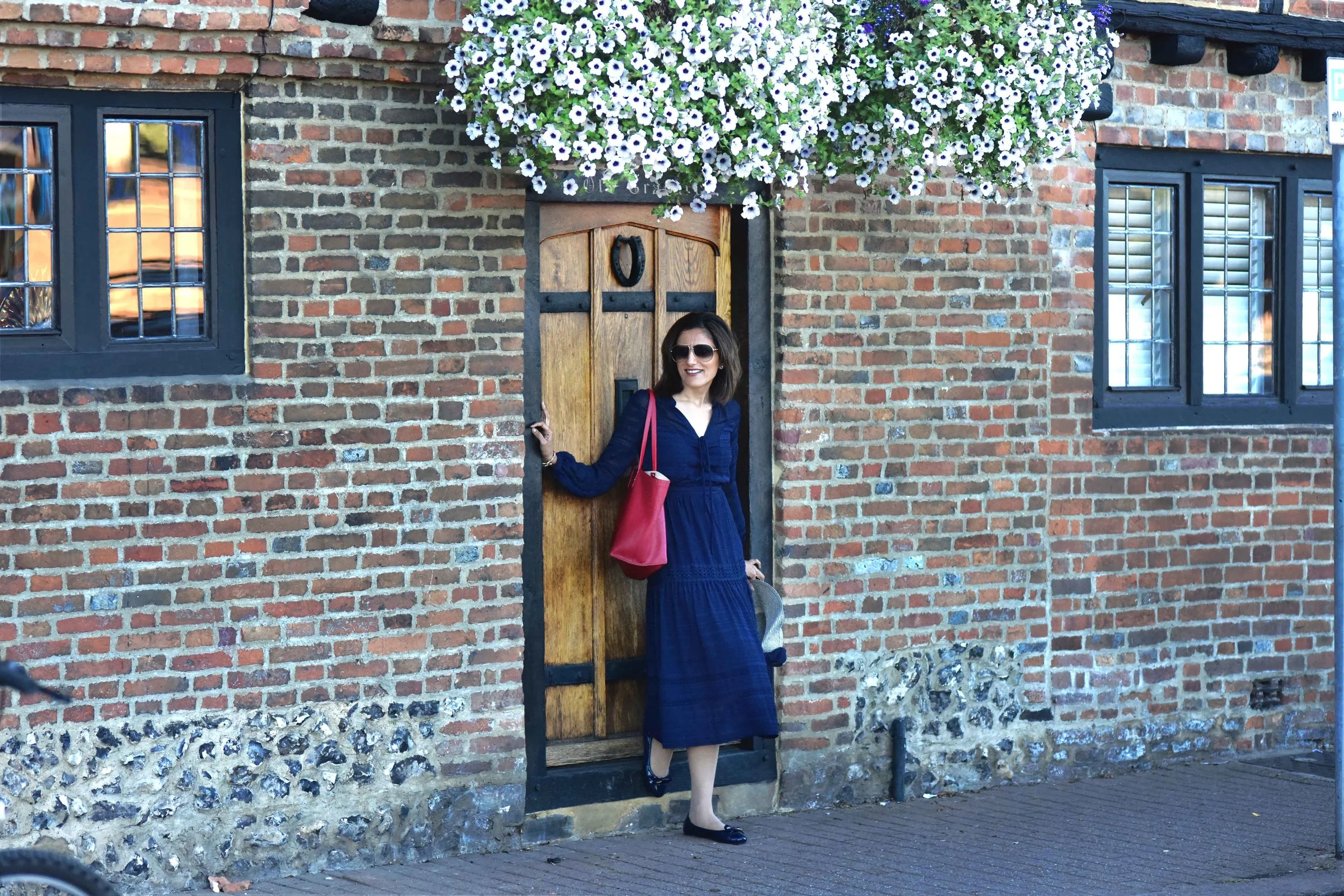 Henley on Thames, Karen Millen dress, red Chloé tote bag, Marks & Spencer hat, Gucci shades, Prada ballet flats. Image©sourcingstyle.com