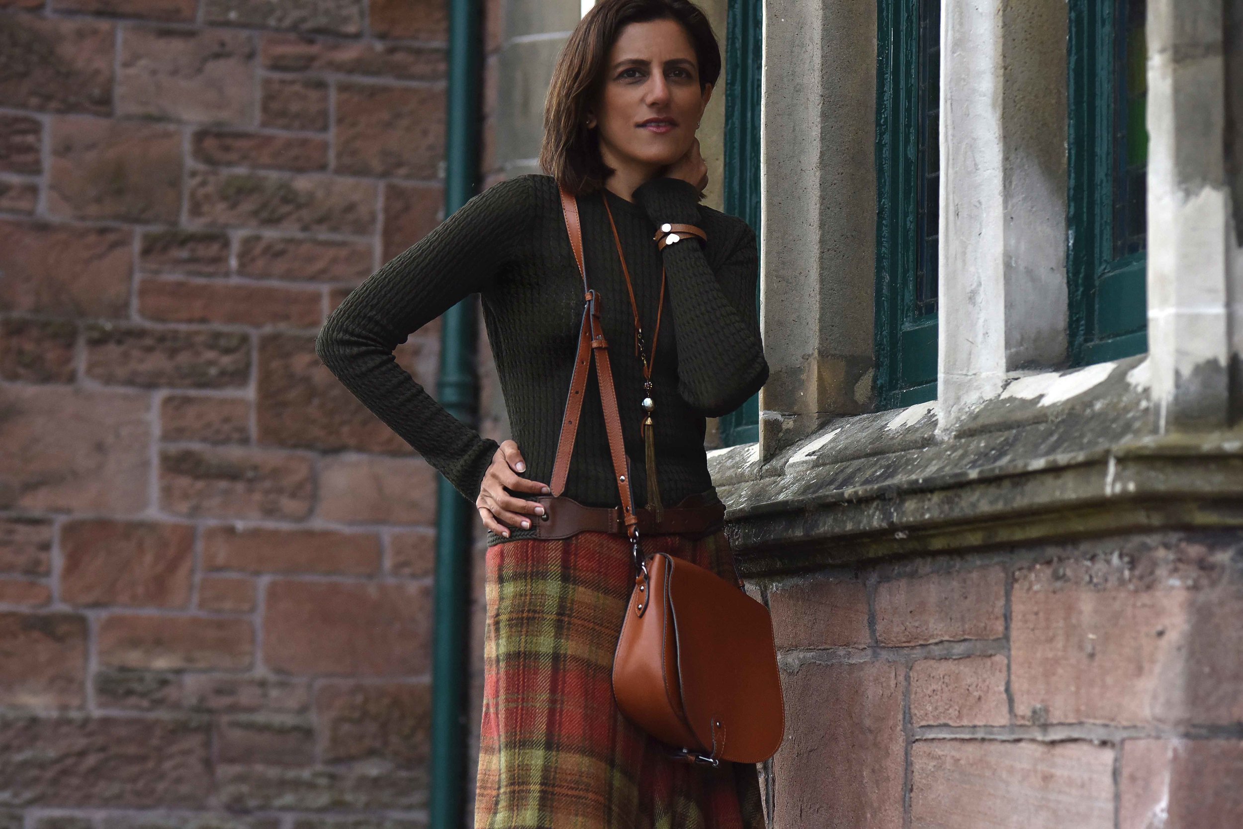 Ralph Lauren Blue Label plaid uneven hem skirt, tan Clarks bag, Inverness. Image©sourcingstyle.com