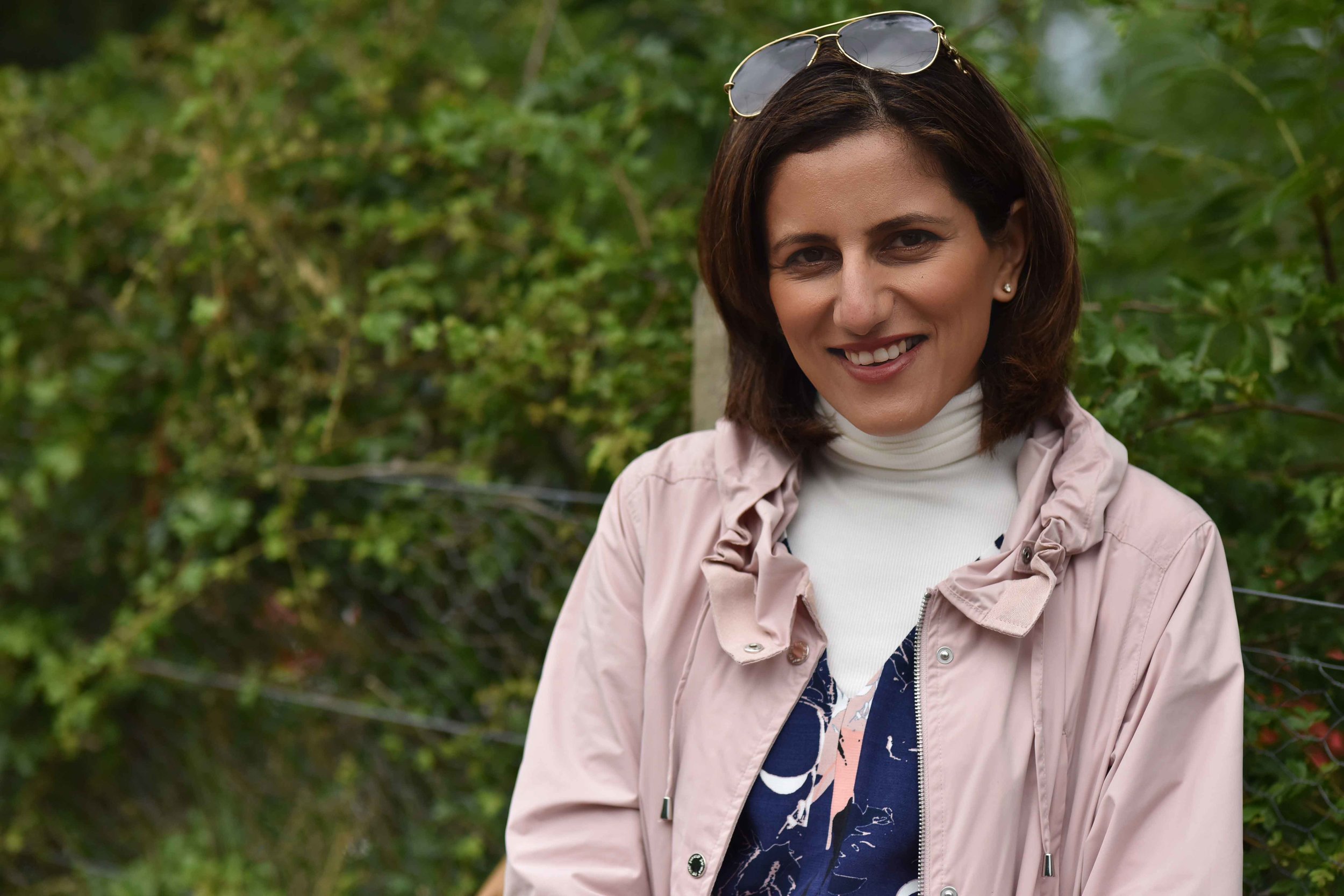 In a pink Marks & Spencer stormwear jacket, Urquhart Castle, Loch Ness, Scotland. Image©sourcingstyle.com