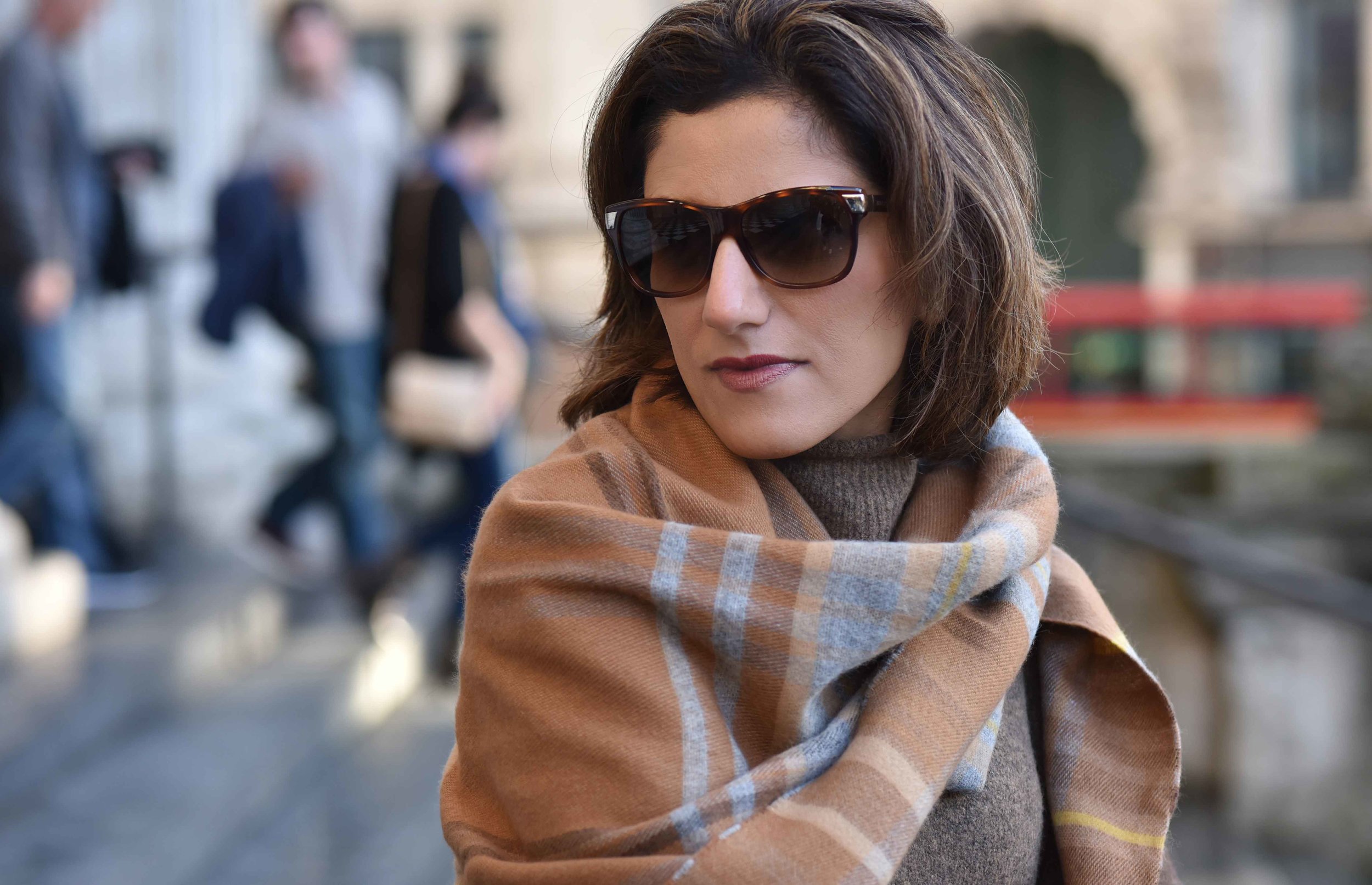 Marks & Spencer sweater dress, Marks & Spencer plaid scarf, Gucci sunglasses. Photo: Alizeh Latif. Image©sourcingstyle.com.