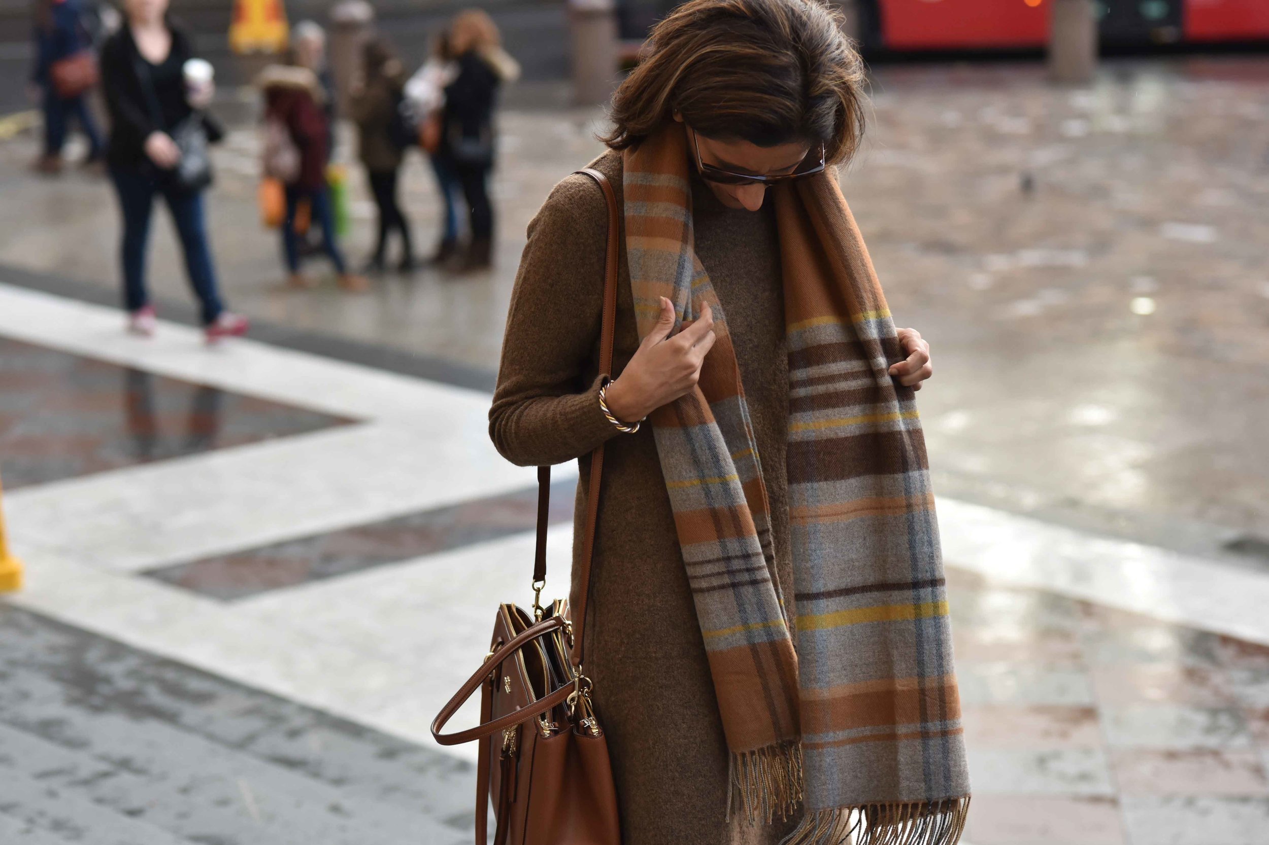 Marks & Spencer sweater dress, Marks & Spencer plaid scarf, Coach handbag, Italian boots, Gucci sunglasses. Photo: Alizeh Latif. Image©sourcingstyle.com.