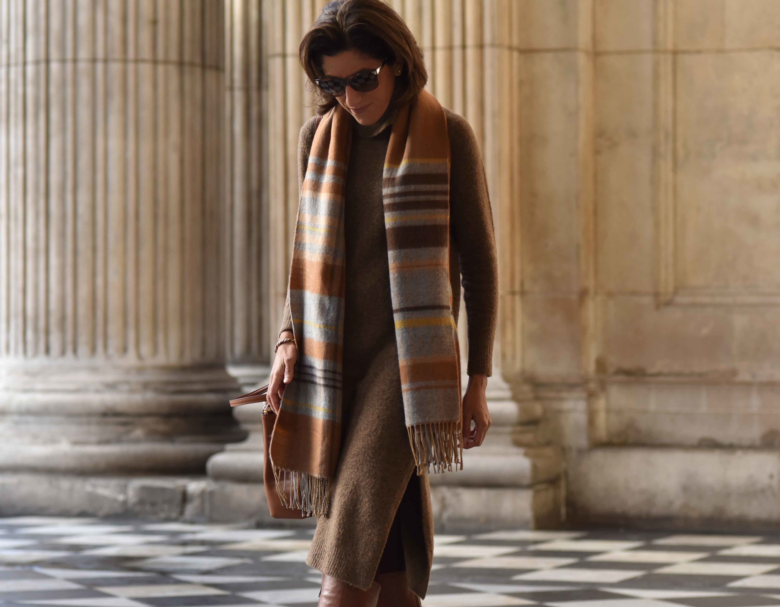 Marks & Spencer sweater dress, Marks & Spencer plaid scarf, Coach handbag, Italian boots, Gucci sunglasses. Photo: Alizeh Latif. Image©sourcingstyle.com.