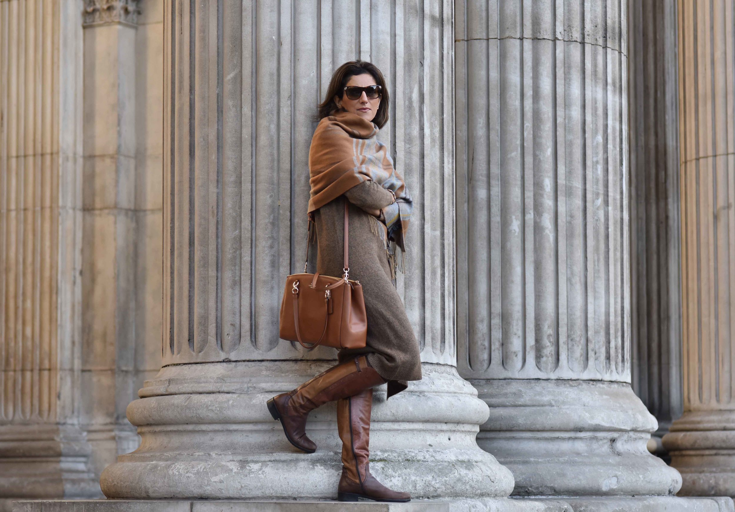 Marks & Spencer sweater dress, Marks & Spencer plaid scarf, Coach handbag, Italian boots, Gucci sunglasses. Photo: Alizeh Latif. Image©sourcingstyle.com.