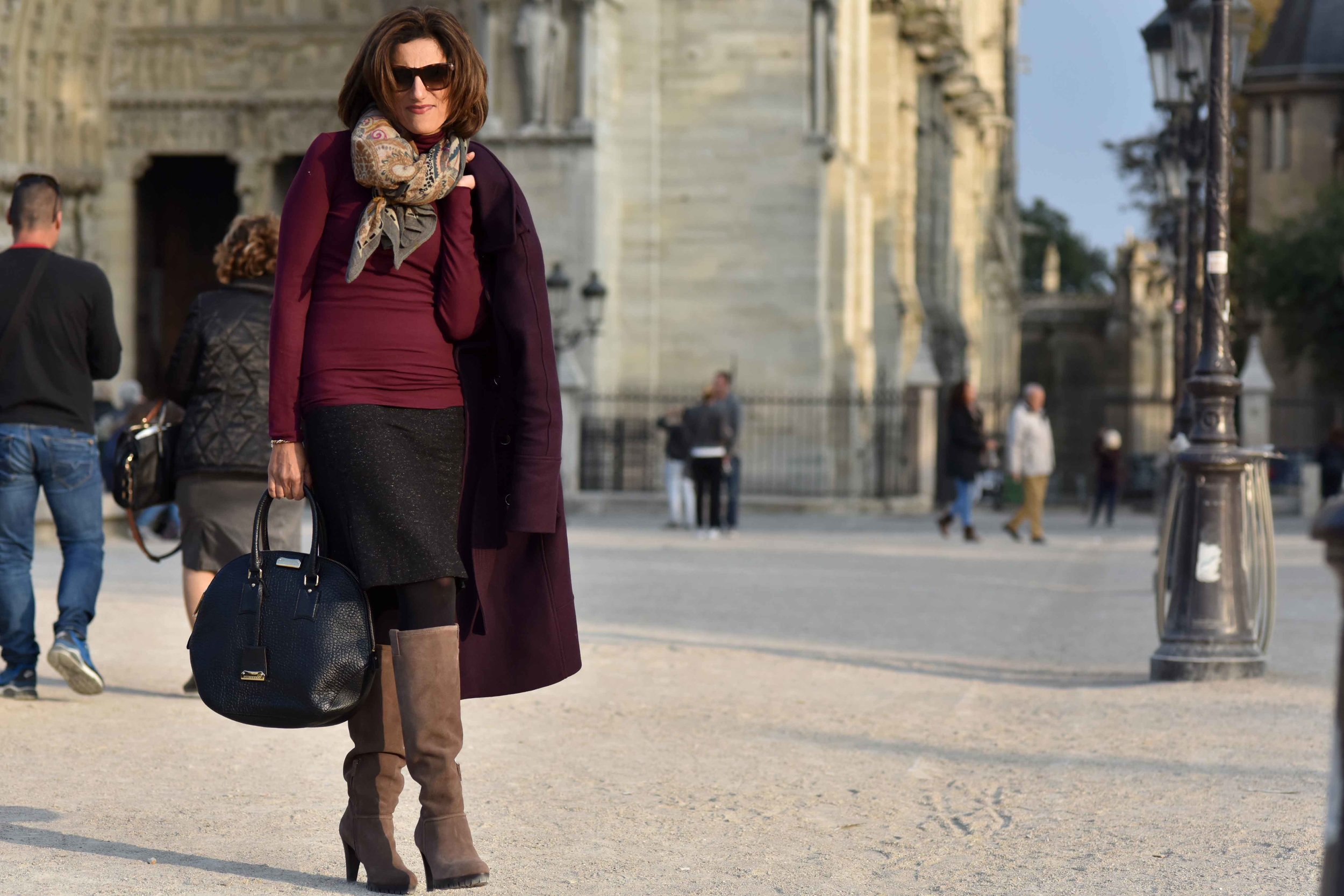 Karen Millen fall winter coat, Karen Millen boots, Talbots skirt, Ralph Lauren polo neck sweater, Burberry bag, Hallhuber scarf, Guccci sunglasses, Notre-Dame, Paris. Image©sourcingstyle.com
