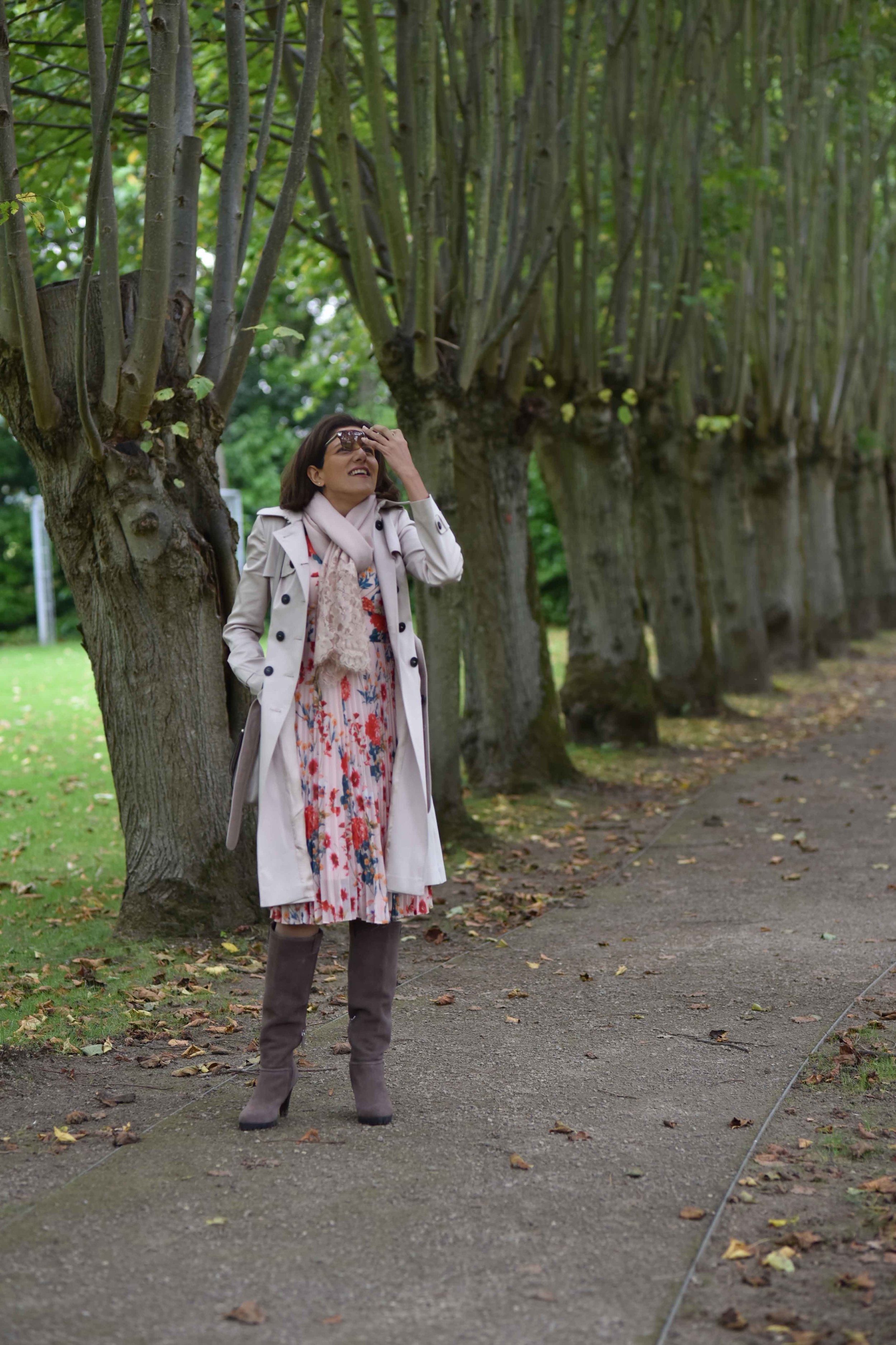 Karen Millen trench coat, Karen Millen floral dress, Karen Millen boots, Coworth Park Hotel, Ascot, U.K. Image©sourcingstyle.com