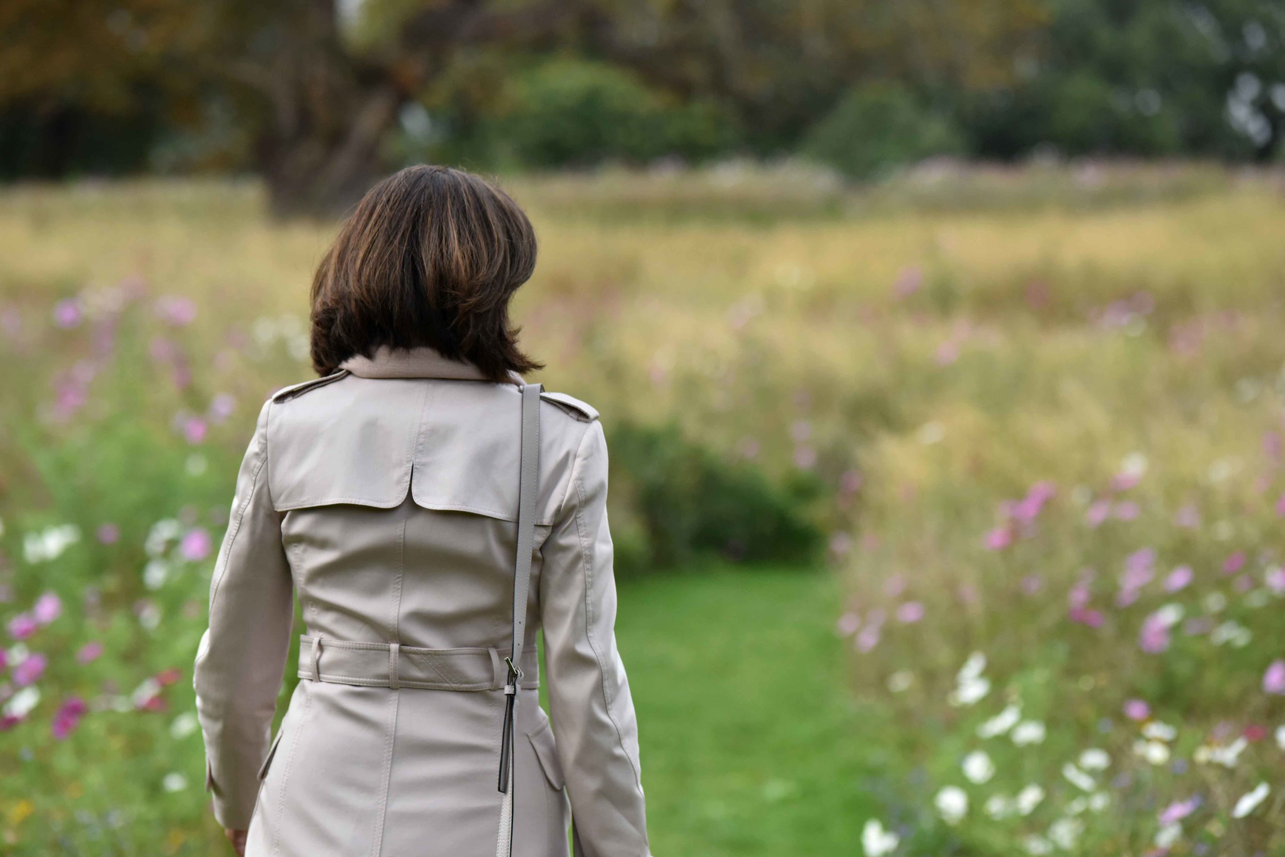 Karen Millen trench jacket, flower fields, Coworth Park hotel, Ascot. Image©sourcingstyle.com