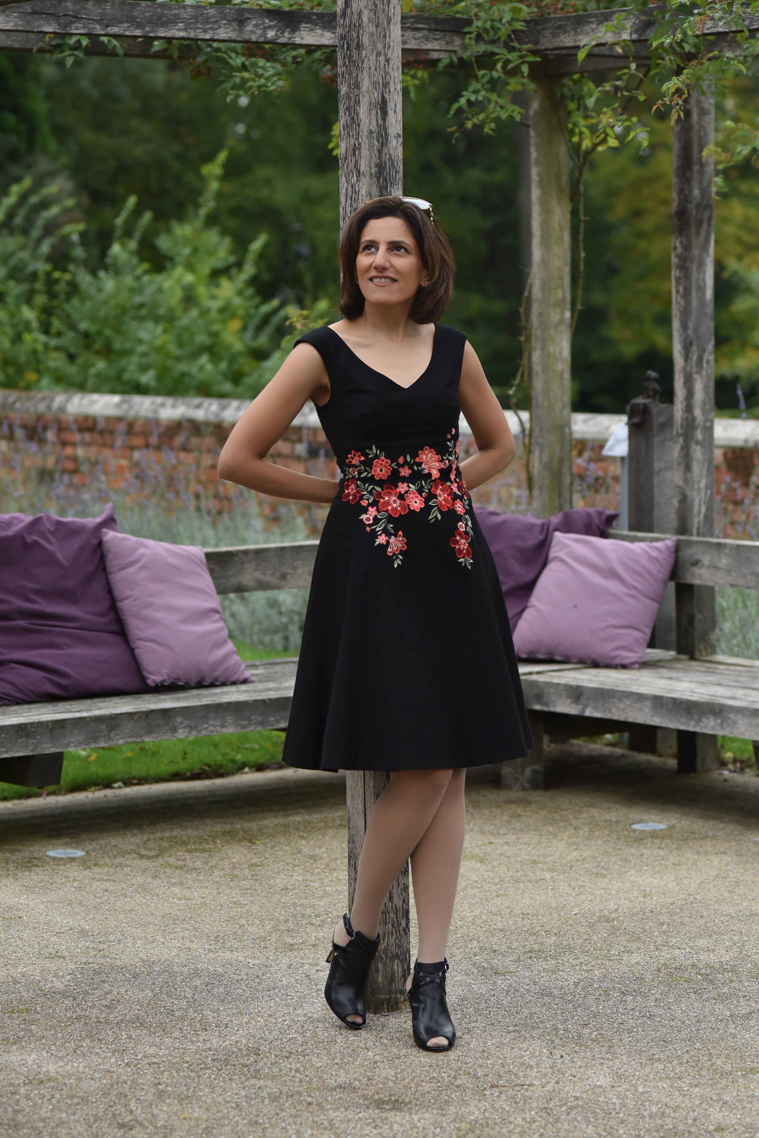 Karen Millen black embroidered dress, sandals, Coworth Park hotel, Dorchester Collection, UK. Image©sourcingstyle.com