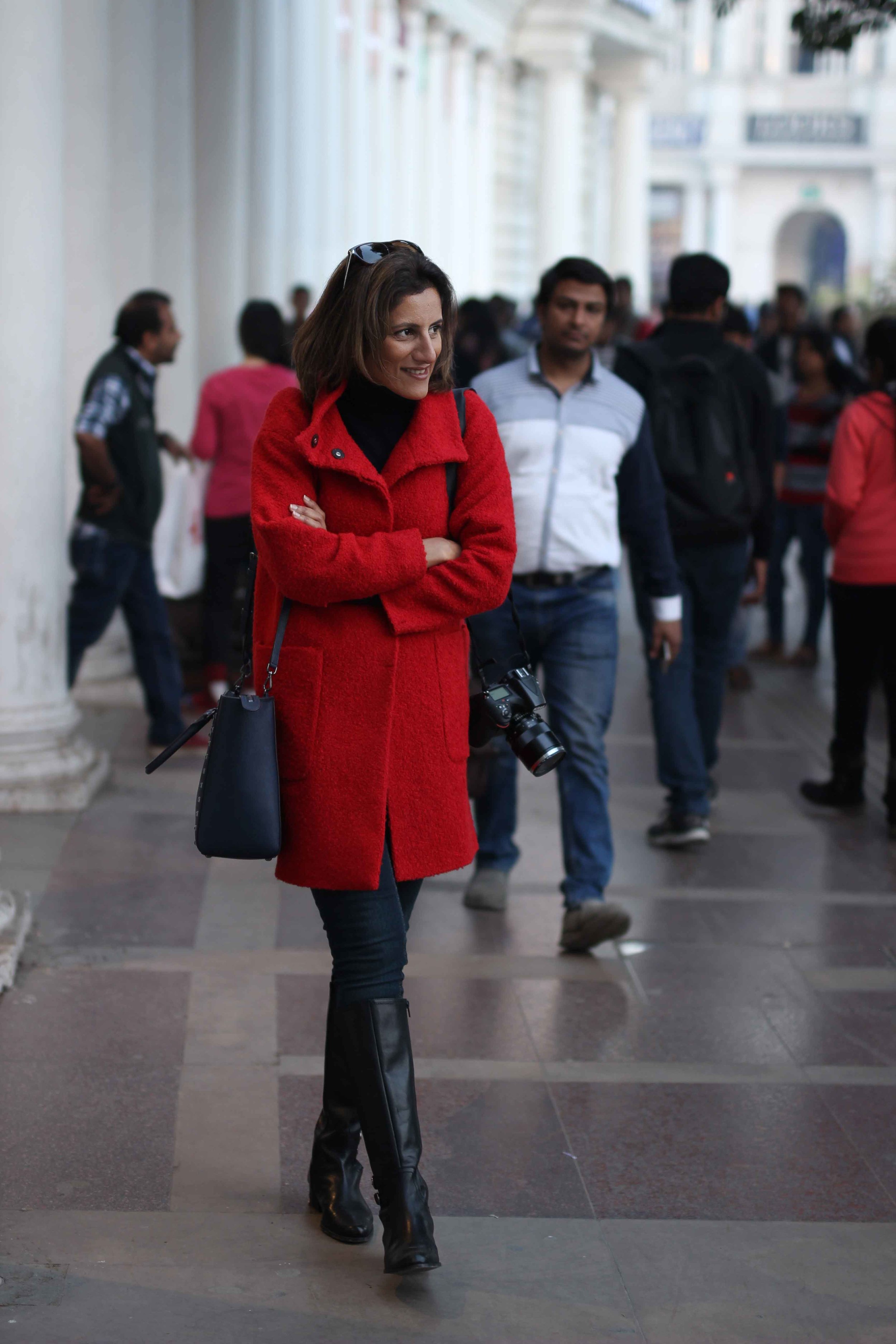 Red coat, Zara, navy Michael Kors bag, black boots, Christmas outfit ideas. Photo: Infinito Photography. Image©sourcingstyle.com
