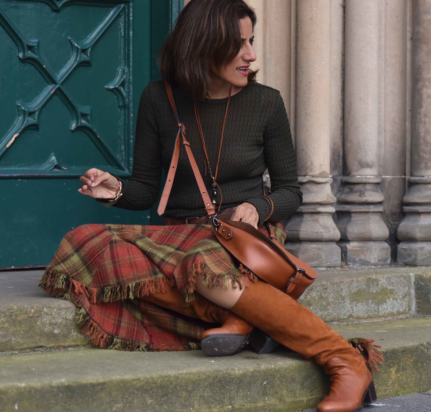 Ralph Lauren Blue Label plaid uneven hem skirt, tan Clarks bag, tan boots, Inverness. Image©sourcingstyle.com