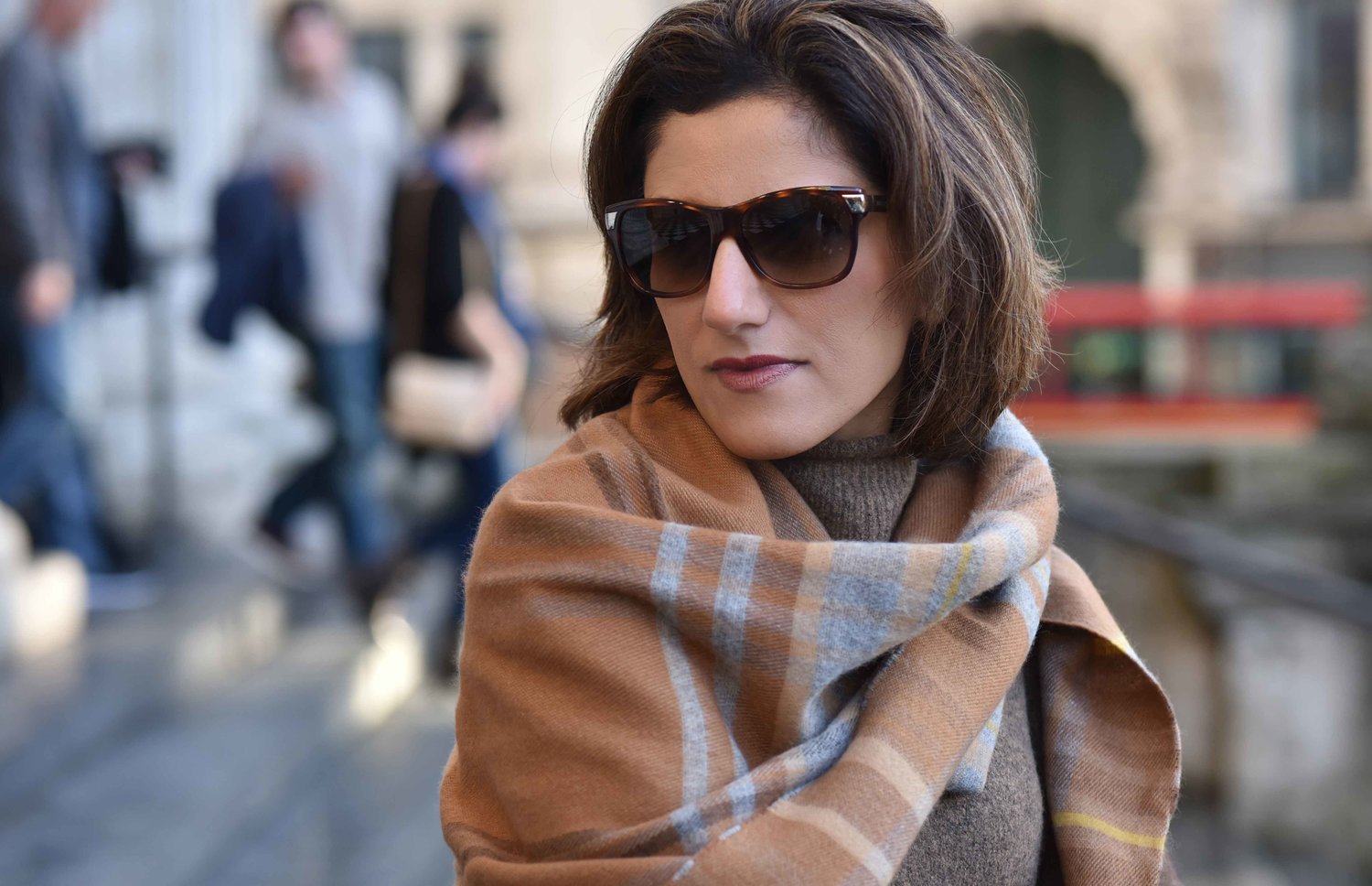 Marks & Spencer sweater dress, Marks & Spencer plaid scarf, Gucci sunglasses. Image©sourcingstyle.com. Photo: Alizeh Latif.