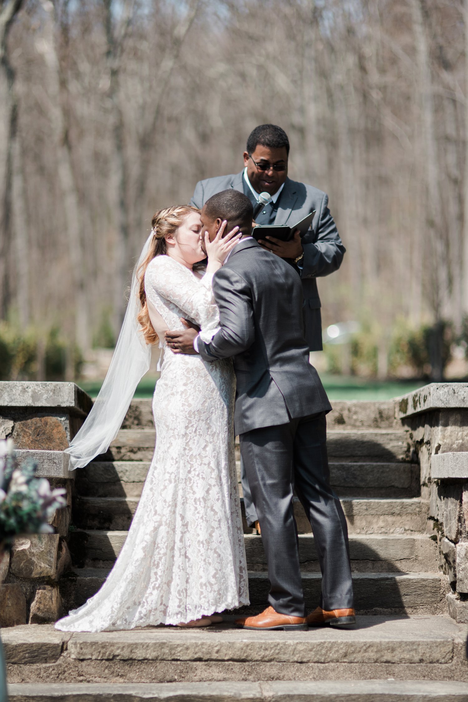 classic-romantic-wedding-maryland-photographer-strong-mansion-sentimental-ceremony-first-kiss