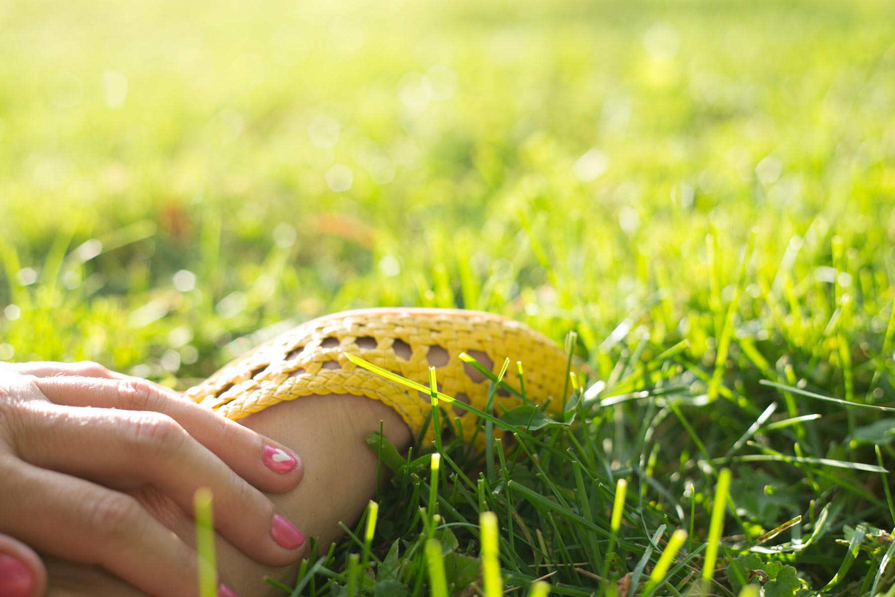 My foot || maybe at a park. maybe in my back yard. 