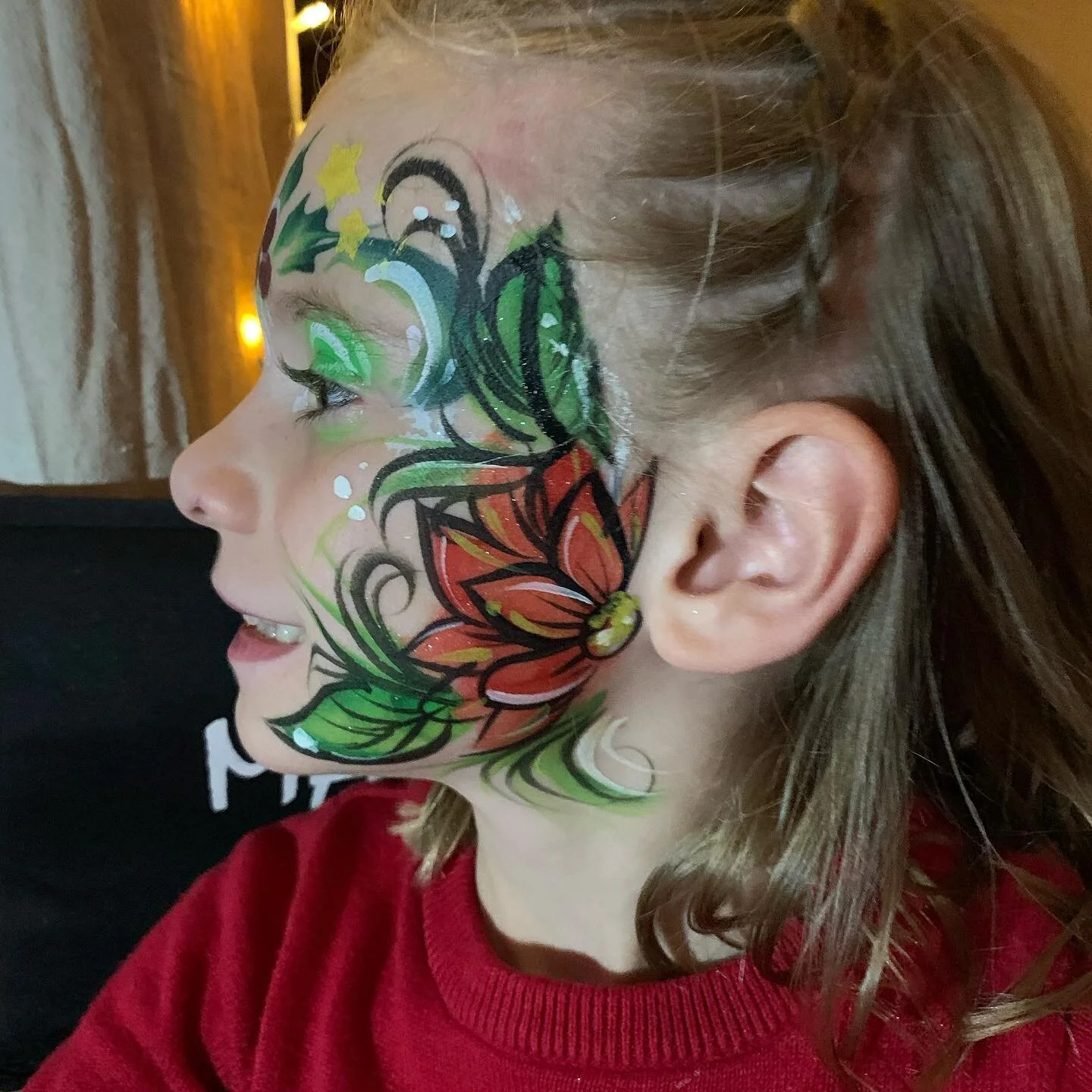 She already had a design done by another artist so what do you do?! A collaboration! It&rsquo;s cool to see different art styles on one face 😊#christmasdesign #facepaint #facepainting