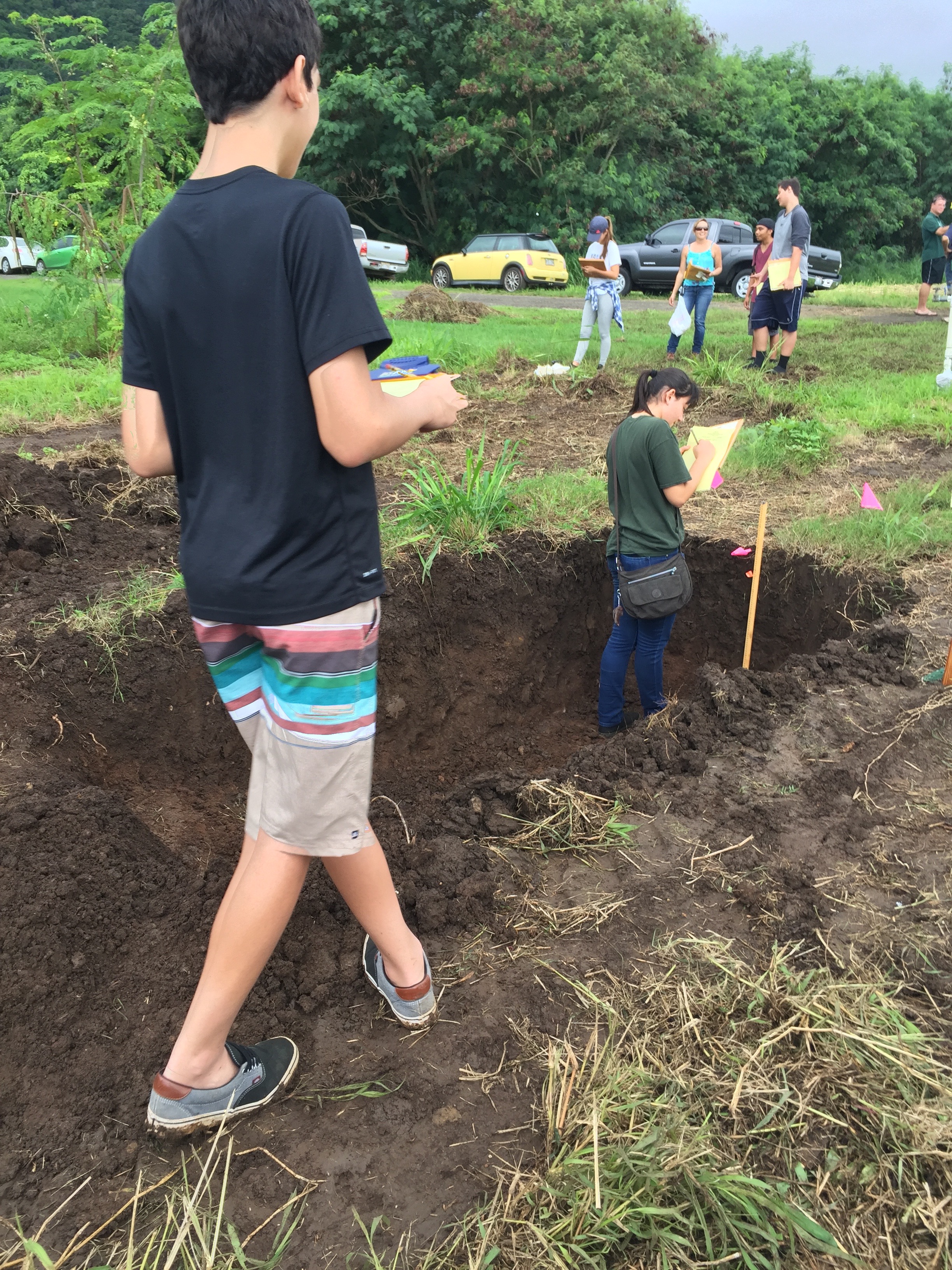 Students judging a pit