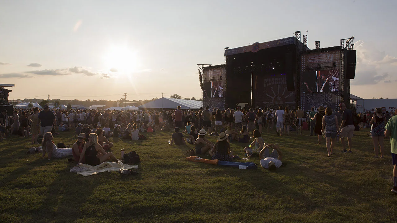 Festival goers watch the sun go down at the 2017 Pilgrimage Festival in Franklin, Tennessee.